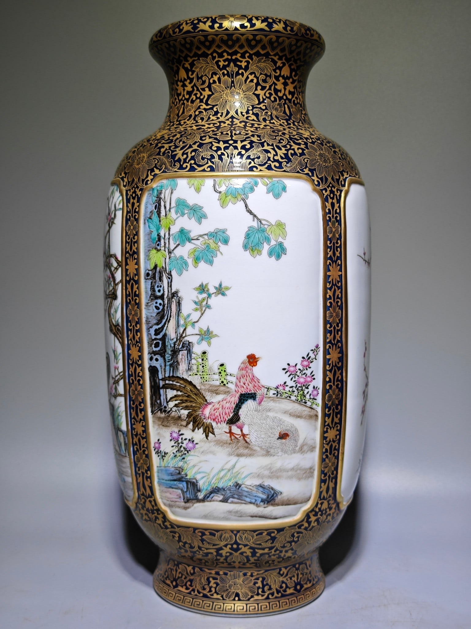 An Exquisite Ji Blue Glazed Painted Gold Flower and Bird Pattern Vase: An Exquisite Ji Blue Glazed Painted Gold Flower and Bird Pattern Vase,Qing Dynasty,China,Qianlong Four-character Mark,Size:16.7inx8.7in 