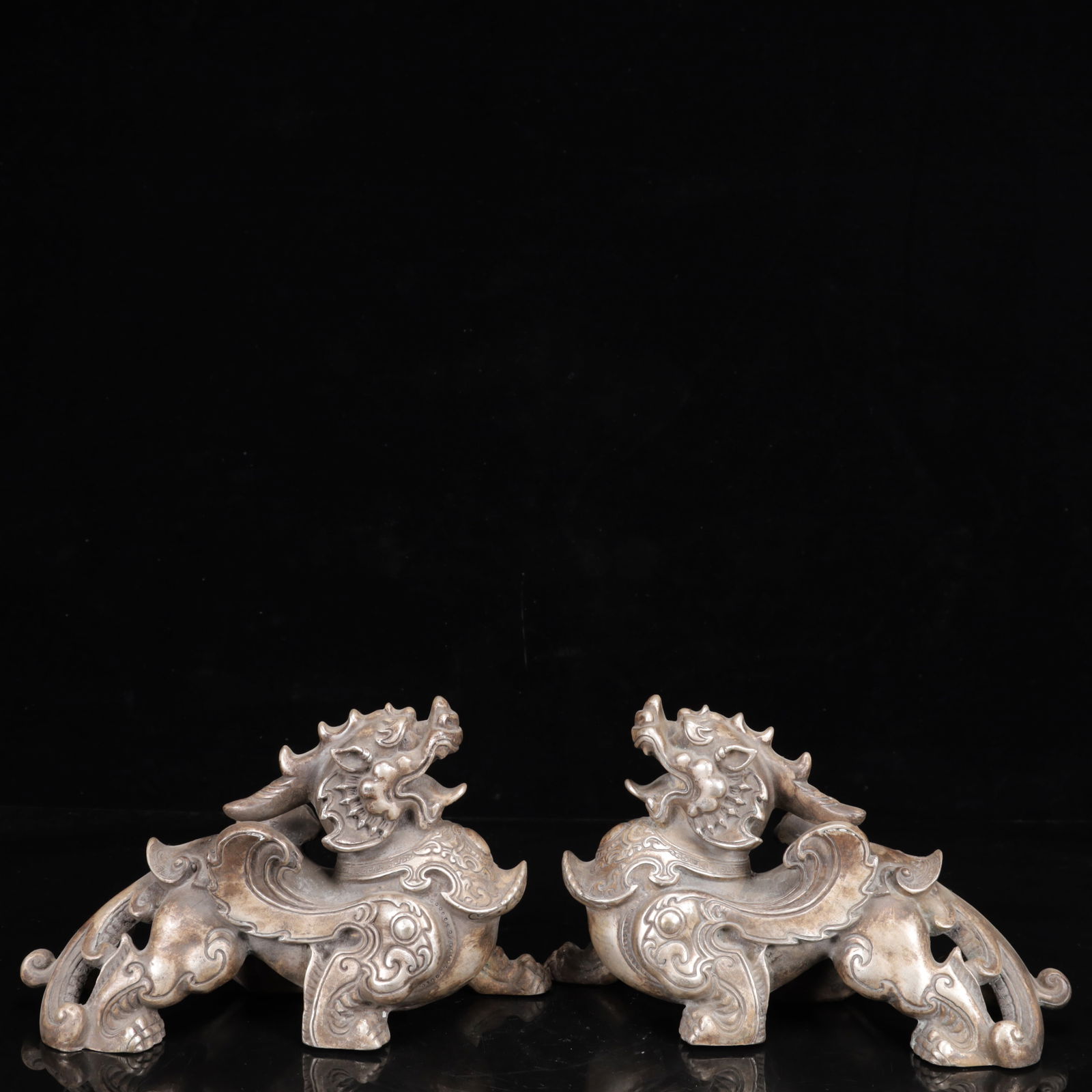 A Pair of Exquisite Silver Lion Ornaments: A Pair of Exquisite Silver Lion Ornaments,Qing Dynasty,China,Size:9.4inx3.5inx5.5in,Weight:3700g 一对银狮子摆件,中国清代