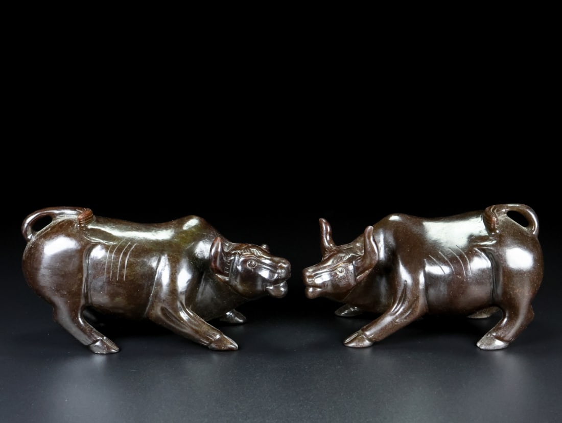 A Pair of Exquisite Archaic Jade Buffalo Ornaments: A Pair of Exquisite Archaic Jade Buffalo Ornaments,Ancient Time,China,Size:4.5inx2inx2.4in,Weight:845g 一对高古玉牛摆件,中国远古