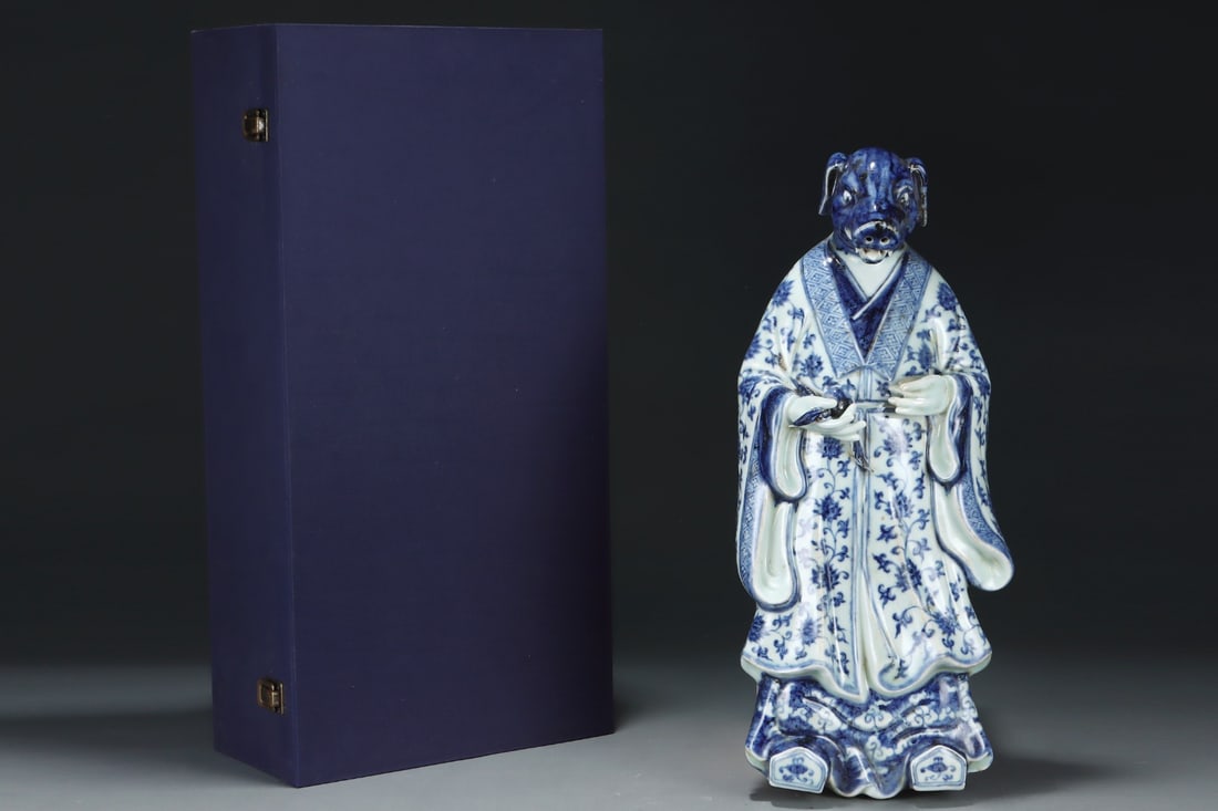 A Huge Blue and White Lotus Pattern Pig Ornament: A Huge Blue and White Lotus Pattern Pig Ornament,Ming Dynasty,China,Xuande Four-Character Mark,Size:18.9inx8.2in 