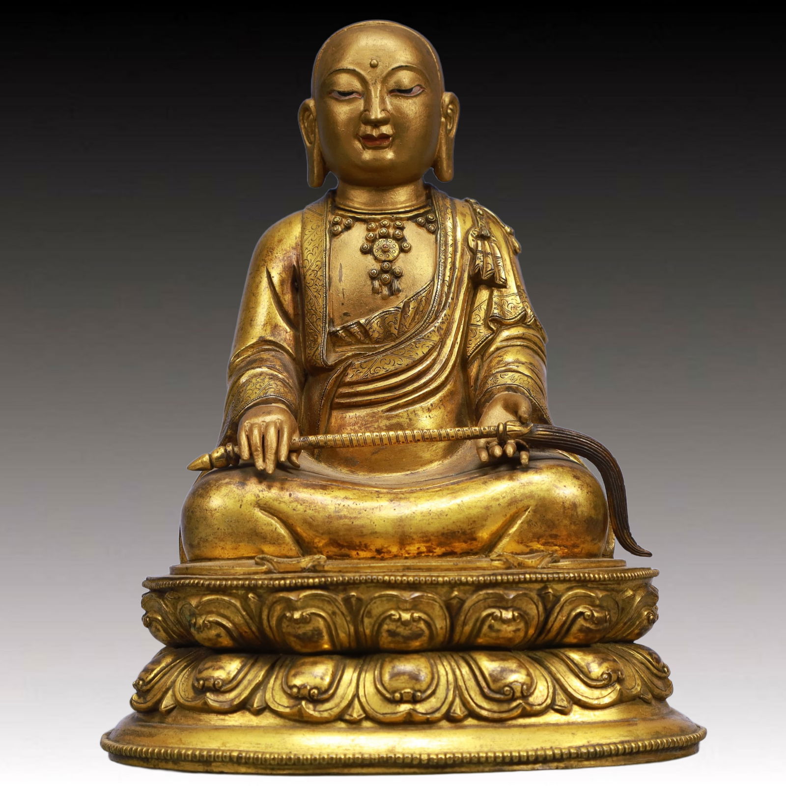 A Solemn Gilt Bronze Statue of Guru: A Solemn Gilt Bronze Statue of Guru,Qing Dynasty, China,Size:6.9inx5.5inx8.7in,Weight:3200g 铜鎏金上师像,中国清代