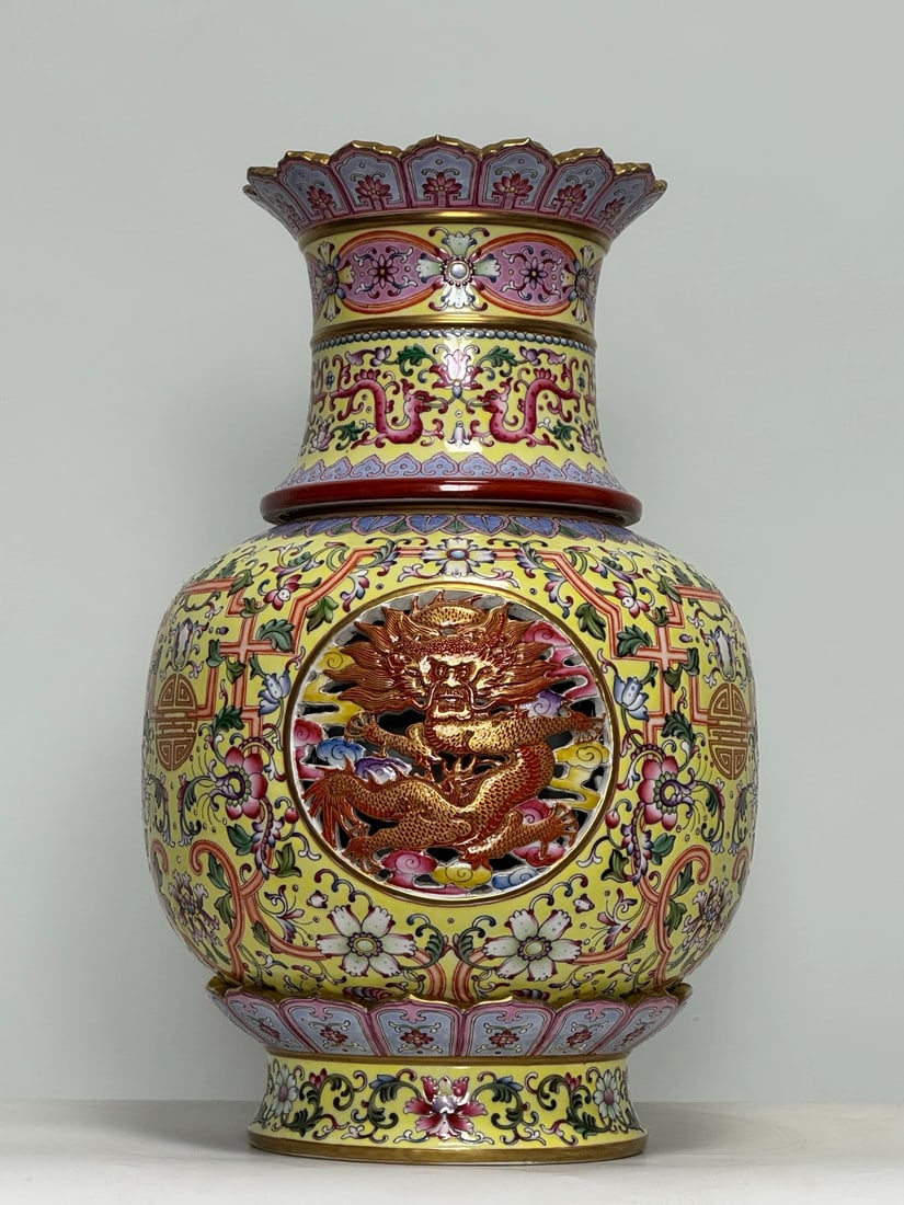 An Exquisite Enamel Yellow Ground Lotus and Dragon Pattern Vase: An Exquisite Enamel Yellow Ground Lotus and Dragon Pattern Vase,Qing Dynasty,China,Qianlong Four-character Mark,Size:16.5inx10in 