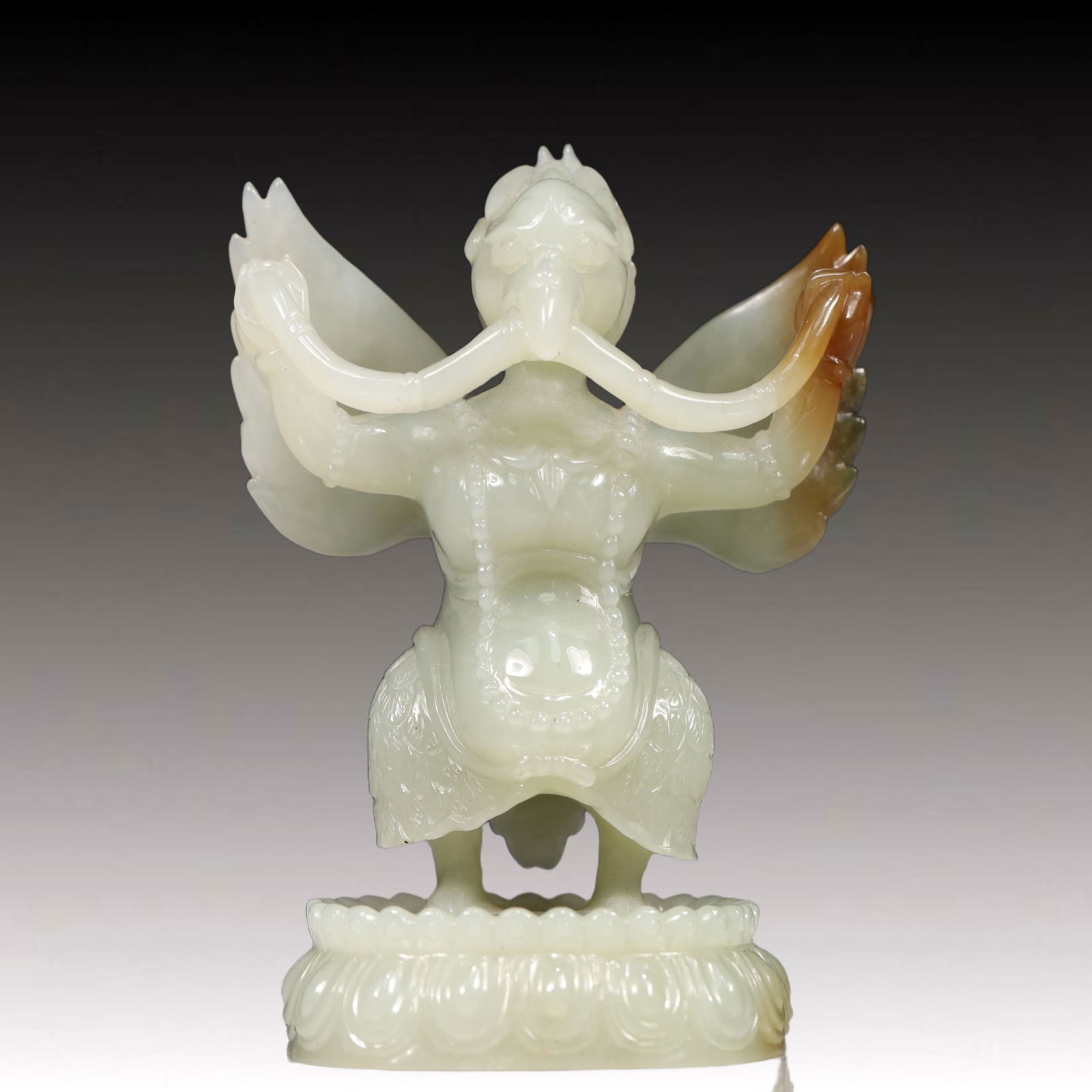 An Exquisite White Jade Roc Ornament: An Exquisite White Jade Roc Ornament,Qing Dynasty, China,Size:2.8inx2inx4.1in,Weight:250g 白玉大鹏鸟摆件,中国清代