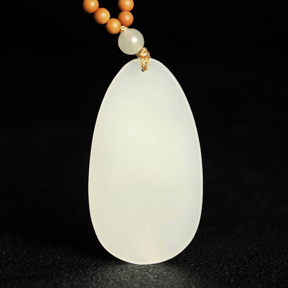 An Exquisite White Jade Buffalo Pattern Pendant - 3