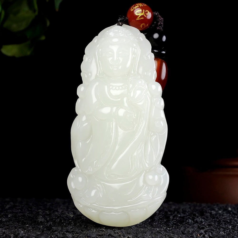 An Exquisite White Jade Statue of Avalokitesvara Pendant: An Exquisite White Jade Statue of Avalokitesvara Pendant,Size:2.5inx1.2inx0.4in 白玉观音像挂件