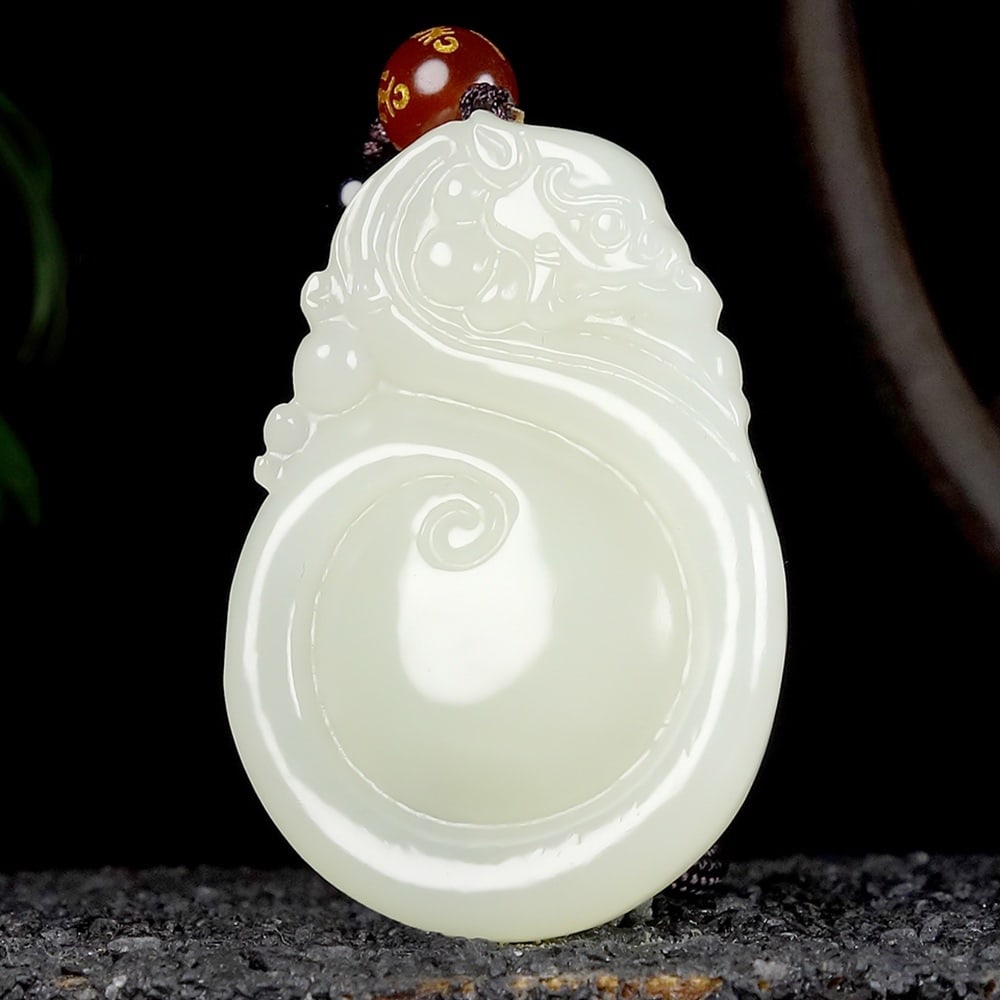 An Exquisite White Jade Ruyi Pendant: An Exquisite White Jade Ruyi Pendant,Size:1.9inx1.3inx0.3in 白玉如意挂件
