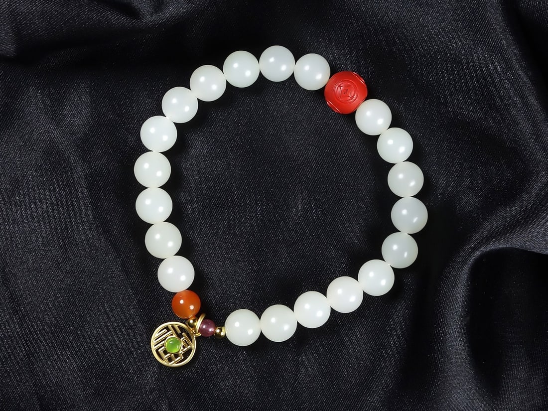 An Exquisite White Jade Bracelets: An Exquisite White Jade Bracelets,Size:(bead)0.3in 白玉手串