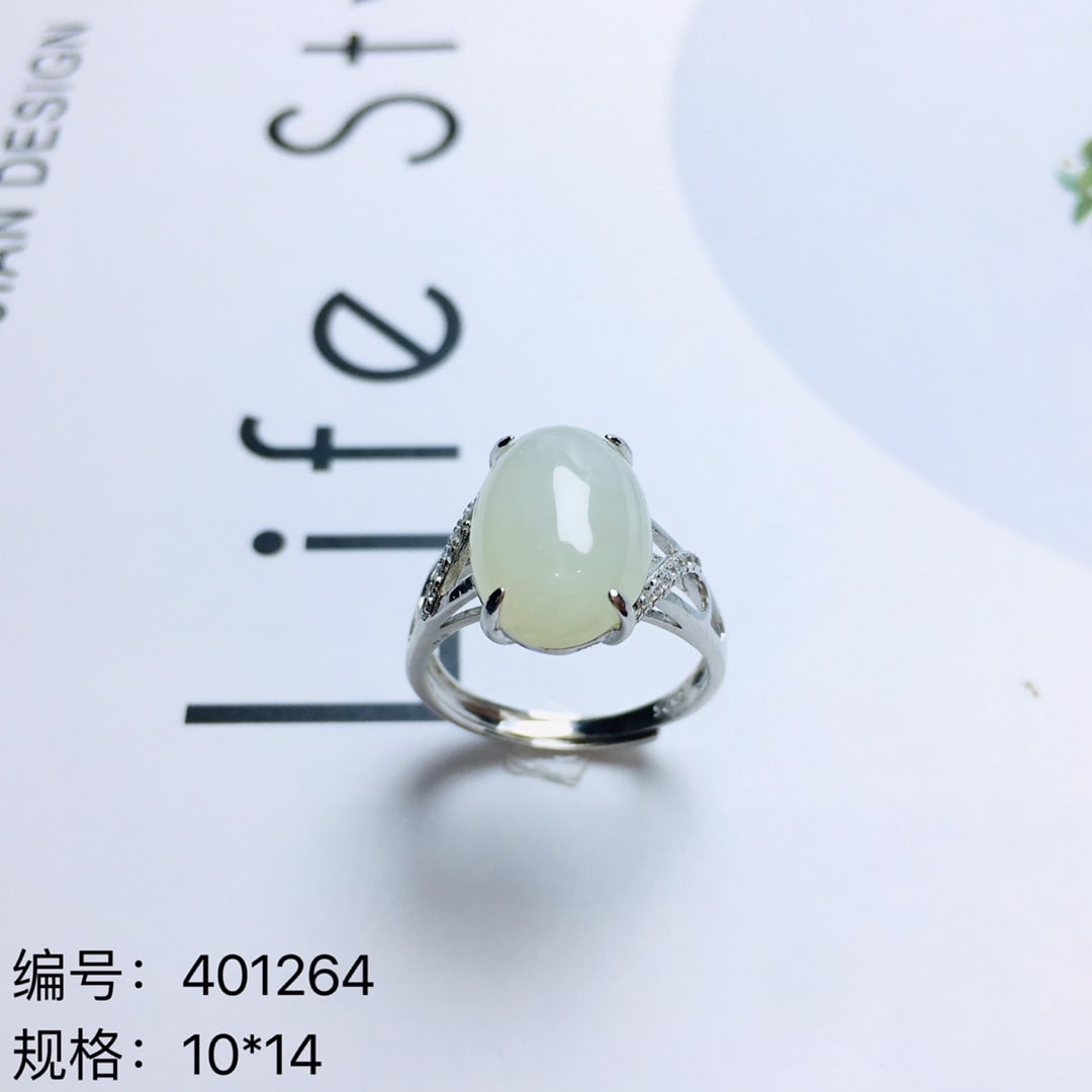 An Exquisite Sterling Silver Inlaid White Jade Ring: An Exquisite Sterling Silver Inlaid White Jade Ring,Size:0.4inx0.6in 纯银镶白玉戒指