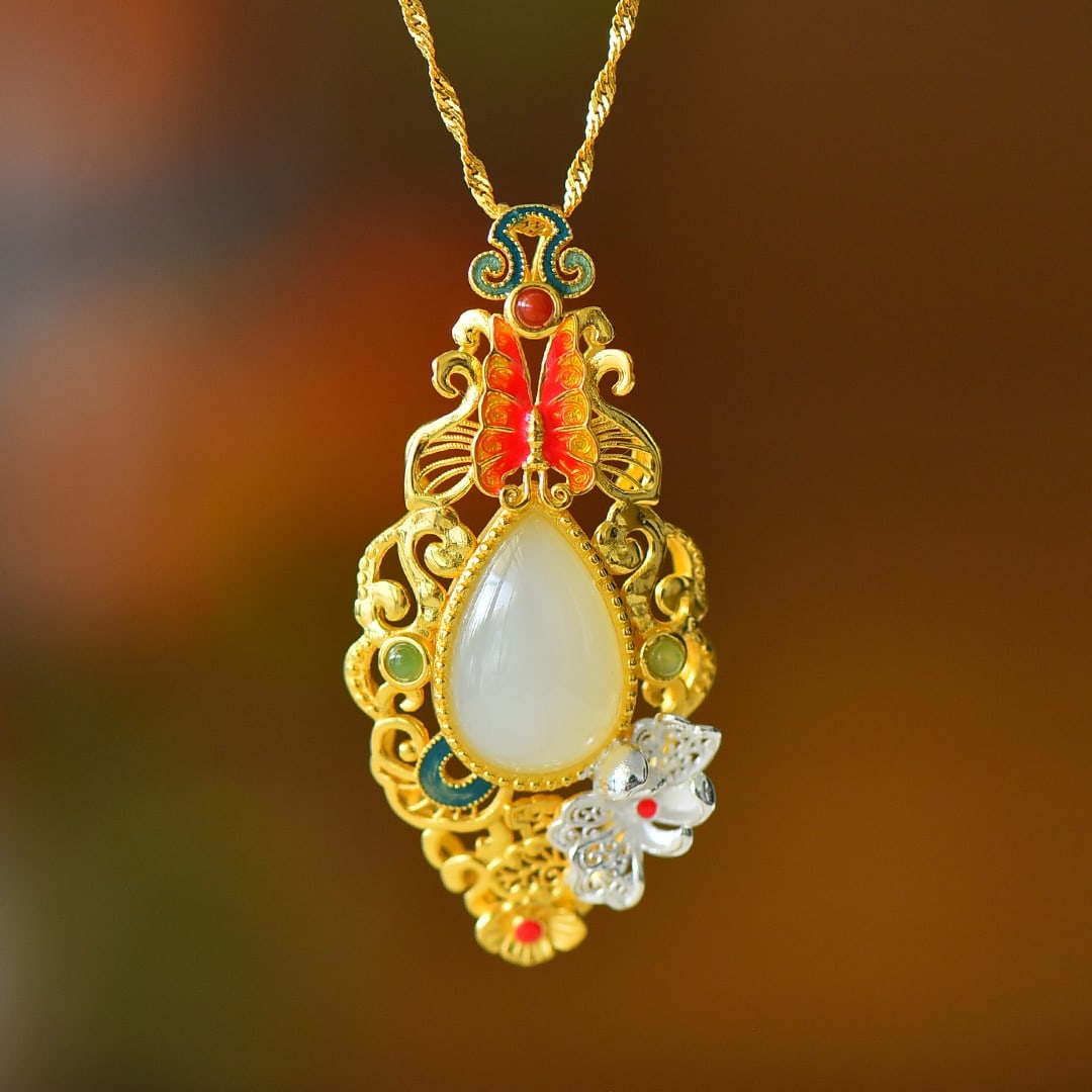 An Exquisite Sterling Silver-Gold Plated Inlaid White Jade Pendant: An Exquisite Sterling Silver-Gold Plated Inlaid White Jade Pendant 纯银镀金镶白玉吊坠