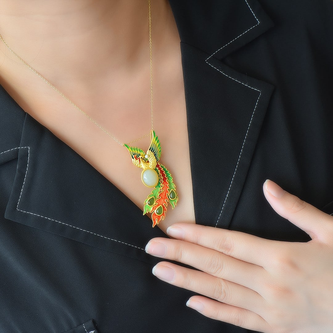 An Exquisite Sterling Silver-Gold Plated Inlaid White Jade Brooch: An Exquisite Sterling Silver-Gold Plated Inlaid White Jade Brooch,Size:0.4inx0.5in 纯银镀金镶白玉胸针