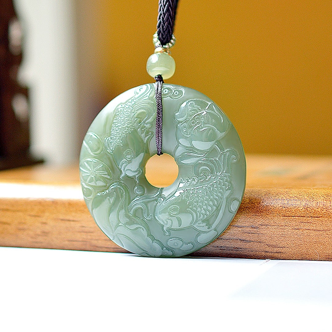 An Exquisite Greenish Jade Fish Pattern Pendant: An Exquisite Greenish Jade Fish Pattern Pendant,Size:1.9inx1.9in 青玉鱼纹挂件