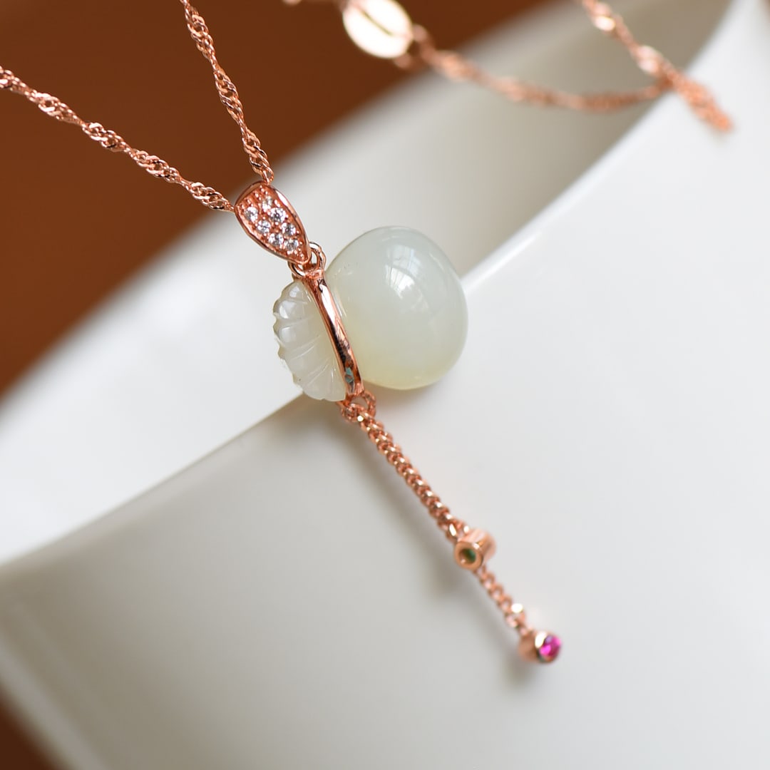 An Exquisite Sterling Silver-Gold Plated Inlaid White Jade Pendant , Inlaid Diamond: Sterling Silver-Gold Plated Inlaid White Jade Pendant , Inlaid Diamond , Size :0.5inx0.6in 