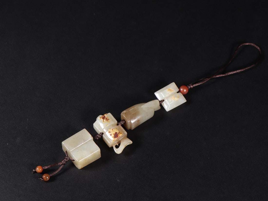 A Set of Fine White Jade Figure Pendant: A Set of Fine White Jade Figure Pendant Han Dynasty, China Size:0.8inx0.3in Size:1.4inx0.7inx0.6in Size:1.5inx0.7inx0.5in Size:0.9inx0.5inx0.5in