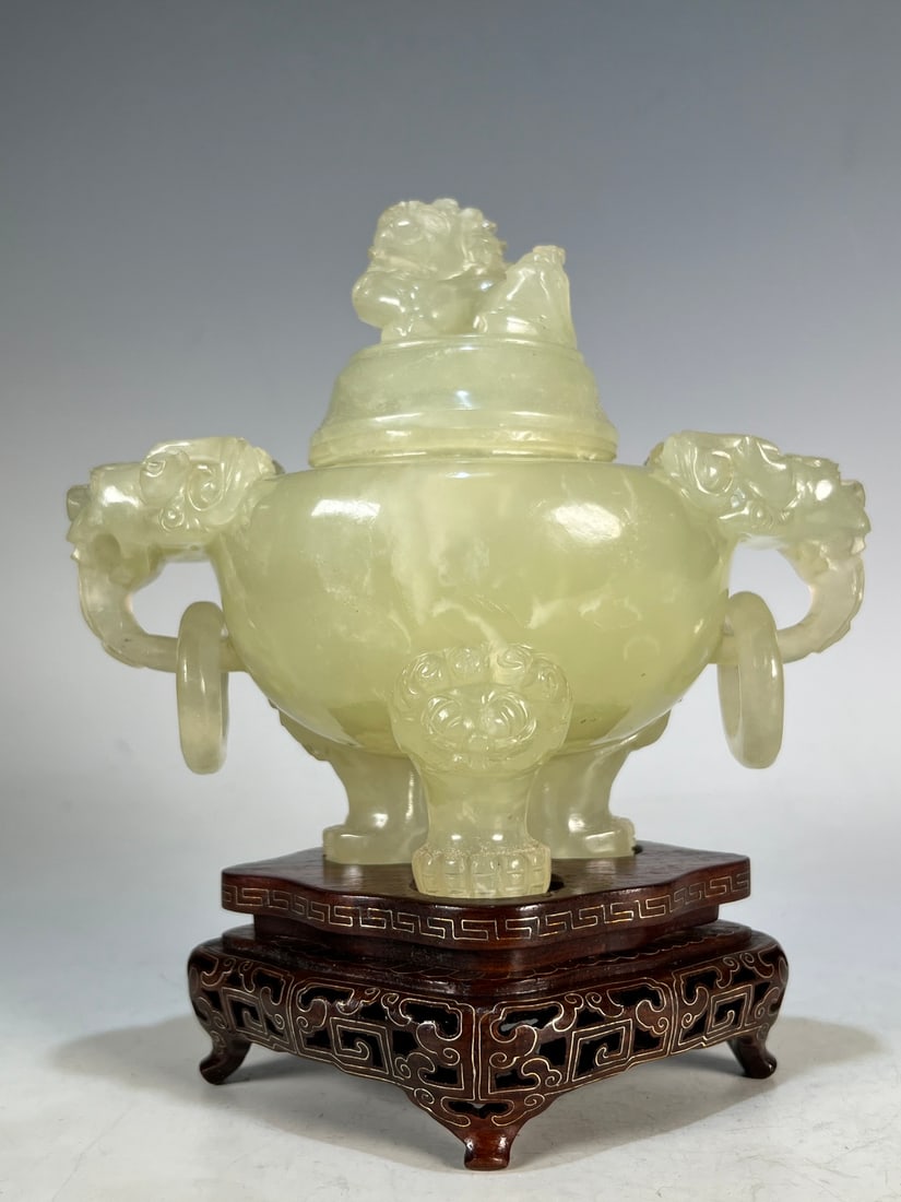 An Exquisite Serpentine Jade Double-Ears and Tripod Censer: An Exquisite Serpentine Jade Double-Ears and Tripod Censer Qing Dynasty, China Size:7.9inx2.2in