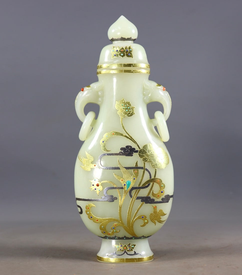 An Exquisite White Jade Gold and Silver Inlaid Gems Flower and Bird Pattern Double-Ears Vase: An Exquisite White Jade Gold and Silver Inlaid Gems Flower and Bird Pattern Double-Ears Vase Qing Dynasty, China Size:9.4inx3.5inx2in Weight:598g白玉错金银镶嵌