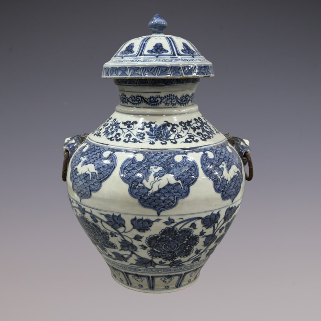 An Exquisite Blue and White Lotus Pattern Double-Ears Jar: An Exquisite Blue and White Lotus Pattern Double-Ears Jar Yuan Dynasty, China Size:18.3in青花缠枝莲纹罐 中国元代 Size:46.5cm