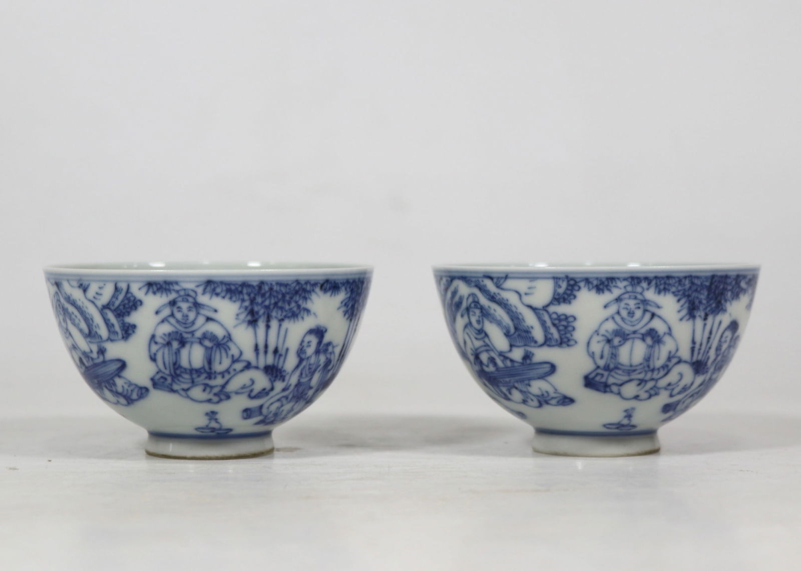 A Pair of Exquisite Blue and White Character and Story Pattern Cup: A Pair of Exquisite Blue and White Character and Story Pattern Cup Qing Dynasty, China Kangxi Six-character Mark