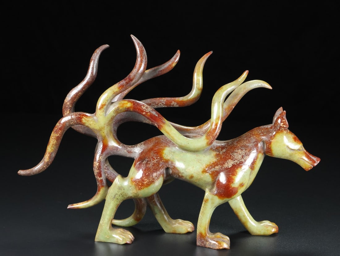 An Exquisite White Jade Fox Ornament: An Exquisite White Jade Fox Ornament Han Dynasty, China Size:5.9inx8.5inx1.7in Weight:491g白玉九尾狐 中国汉代 Size:15cmx21.5cmx4.2cm Weight:491g