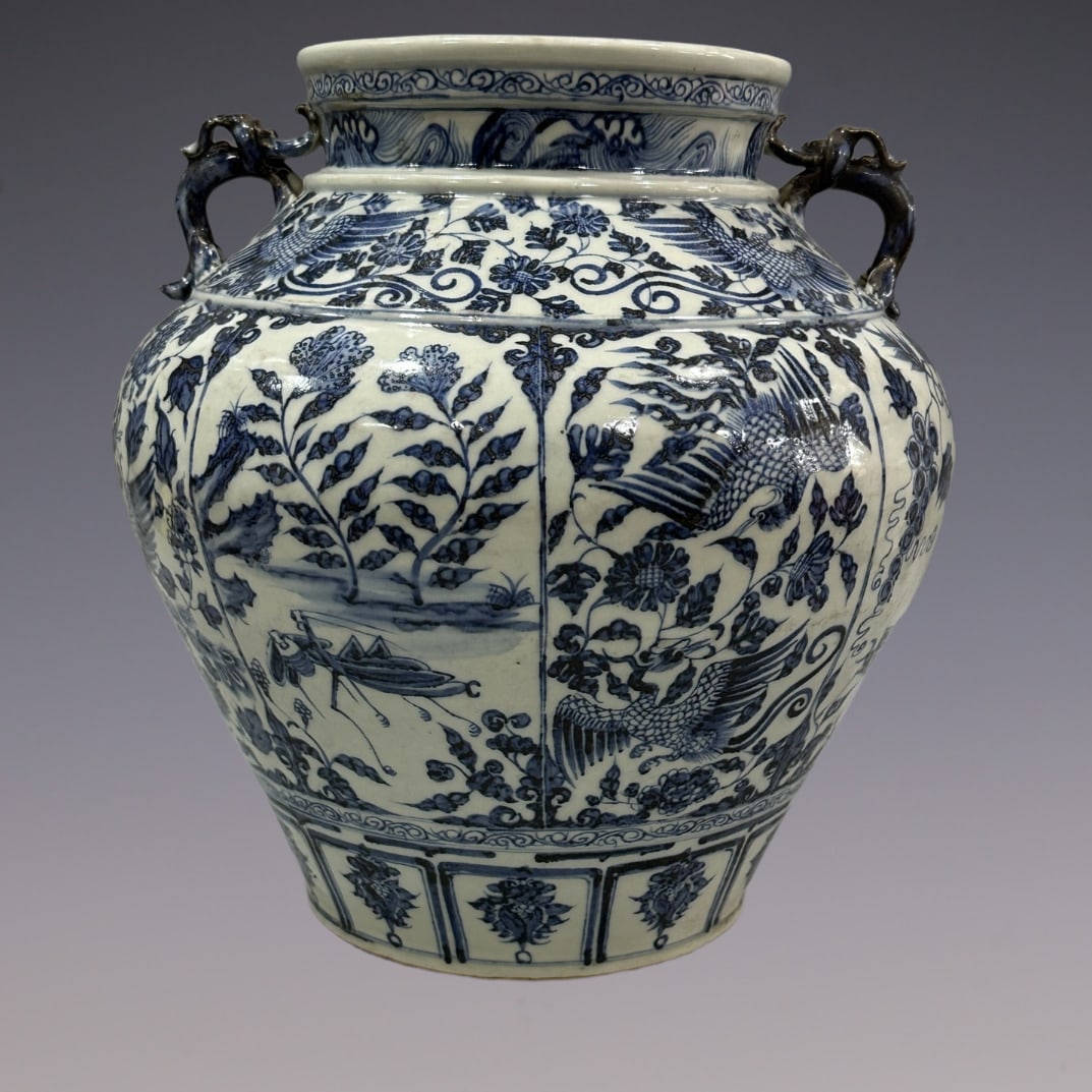 An Exquisite Blue and White Lotus Pattern Phoenix Pattern Double-Ears Jar: An Exquisite Blue and White Lotus Pattern Phoenix Pattern Double-Ears Jar Yuan Dynasty, China Size:13.6in青花缠枝莲凤凰大罐 中国ࠠ