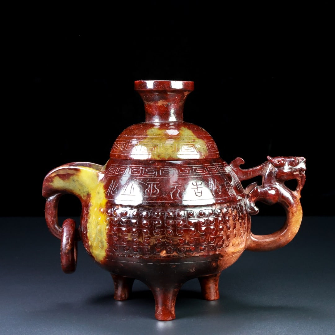 An Exquisite White Jade Dragon Pattern With Inscription Tripod Ewer: An Exquisite White Jade Dragon Pattern With Inscription Tripod Ewer Han Dynasty, China Size:8.2inx6.8inx5in Weight:1.14kg白玉酒壶 中国汉代 Size:20.9cmx1