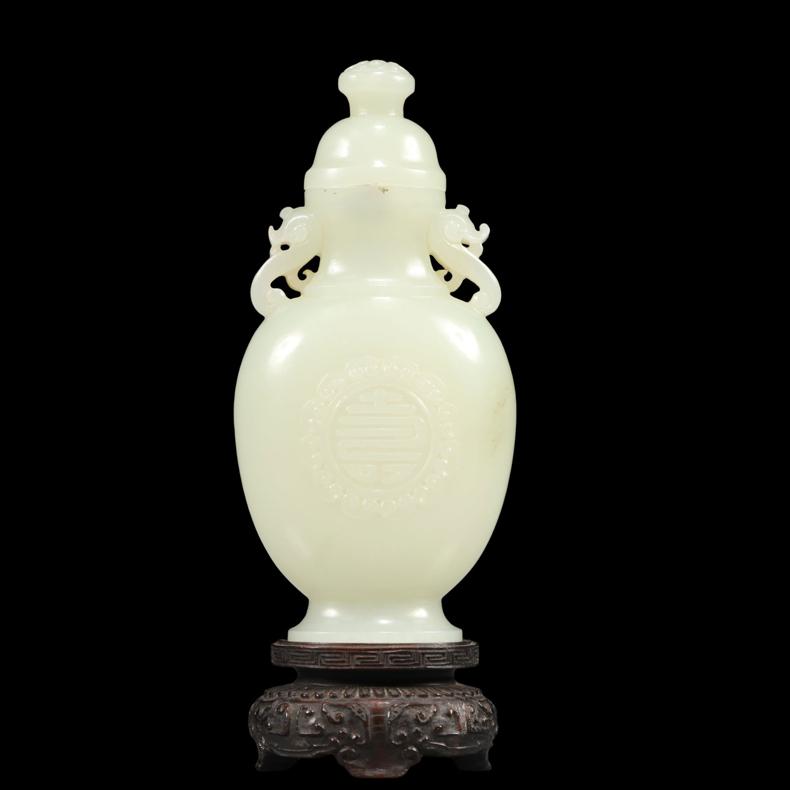 A Exquisite White Jade Double-Ears Vase: A Exquisite White Jade Double-Ears Vase Qing Dynasty, China Size:2.4inx1inx4.7in Weight:100g白玉双耳瓶 中国清代 Size:6cmx2.5cmx12cm Weight:100g