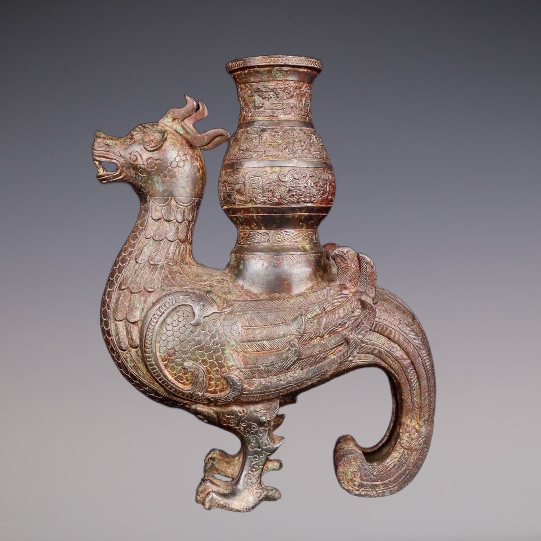 An Exquisite Bronze Dragon Phoenix Pattern Censer: An Exquisite Bronze Dragon Phoenix Pattern Censer Han Dynasty, China Size:11.4inx13in Weight:3515g青铜龙凤尊 中国汉代 Size:29cmx33cm Weight:3515g