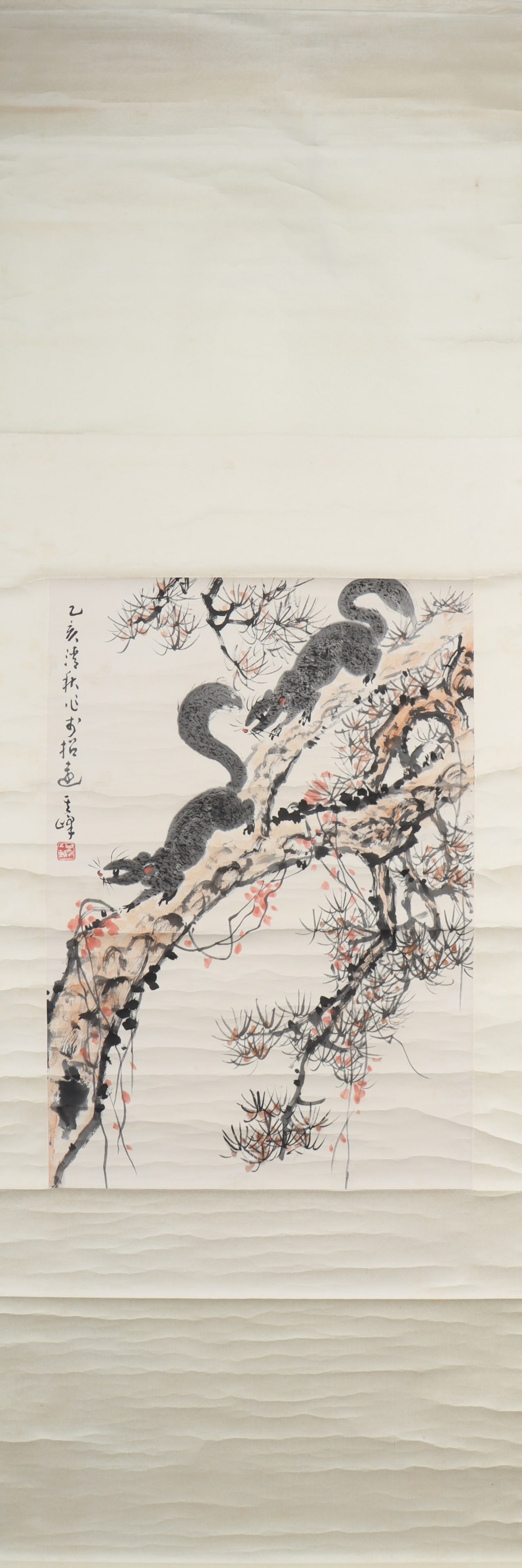 A Chinese Vertical Scroll Ink Painting of Squirrel on Paper: A Chinese Vertical Scroll Ink Painting of Squirrel on Paper Sun qifeng Size:26.8inx18.5in孙奇峰松树 纸本立轴Size:68cmx47cm