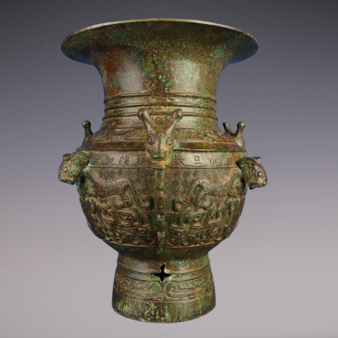 An Exquisite Bronze Beast-Face Pattern With Inscription Vase: An Exquisite Bronze Beast-Face Pattern With Inscription Vase W.Zhou , China Size:11.8inx13.4in Weight:5900g青铜龙虎尊 西周时期 Size:30cmx34cm