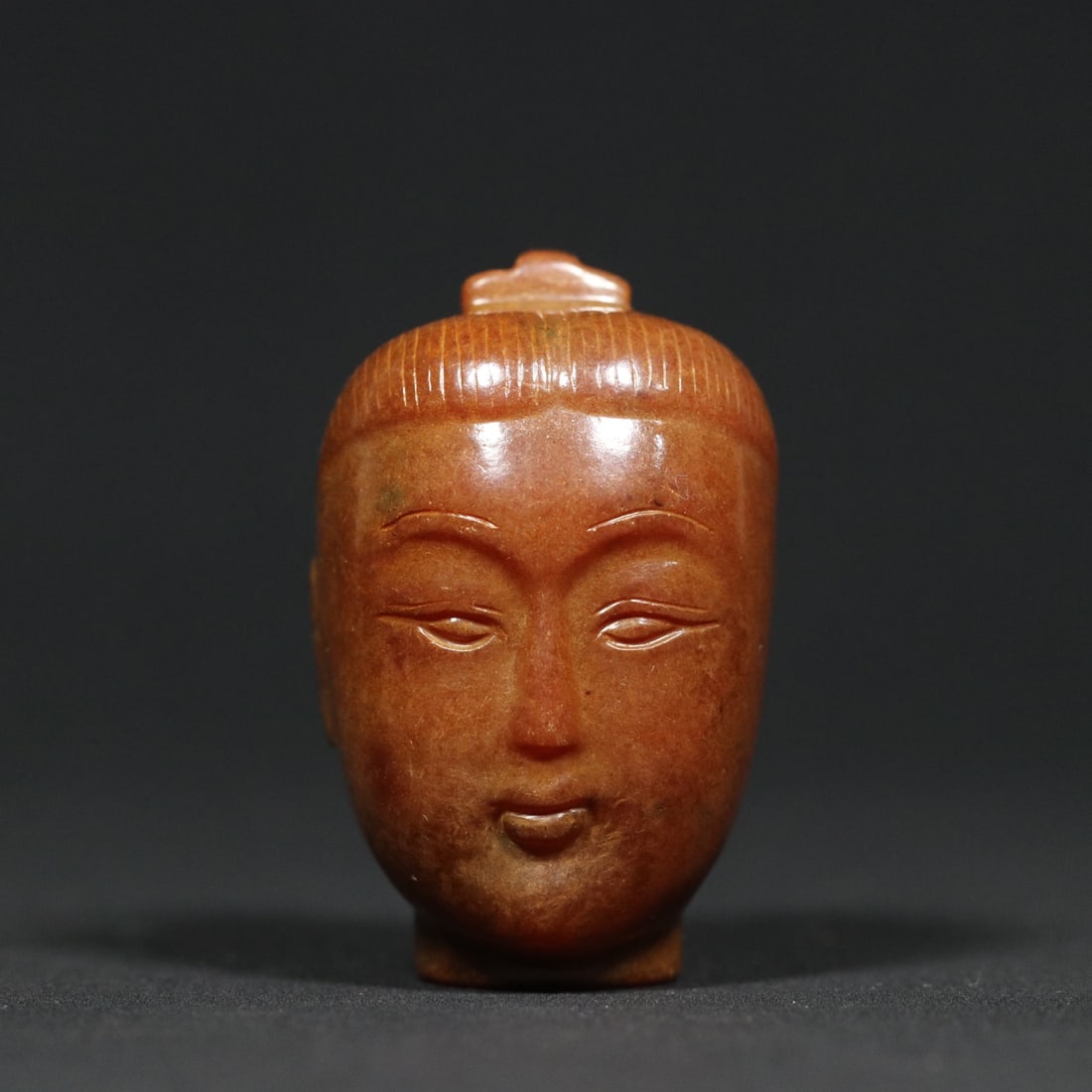 An Exquisite White Jade Head Pendant: An Exquisite White Jade Head Pendant Han Dynasty, China Size:1.9inx1.3inx1.2in Weight:83.8g白玉玉人首挂件 中国汉代