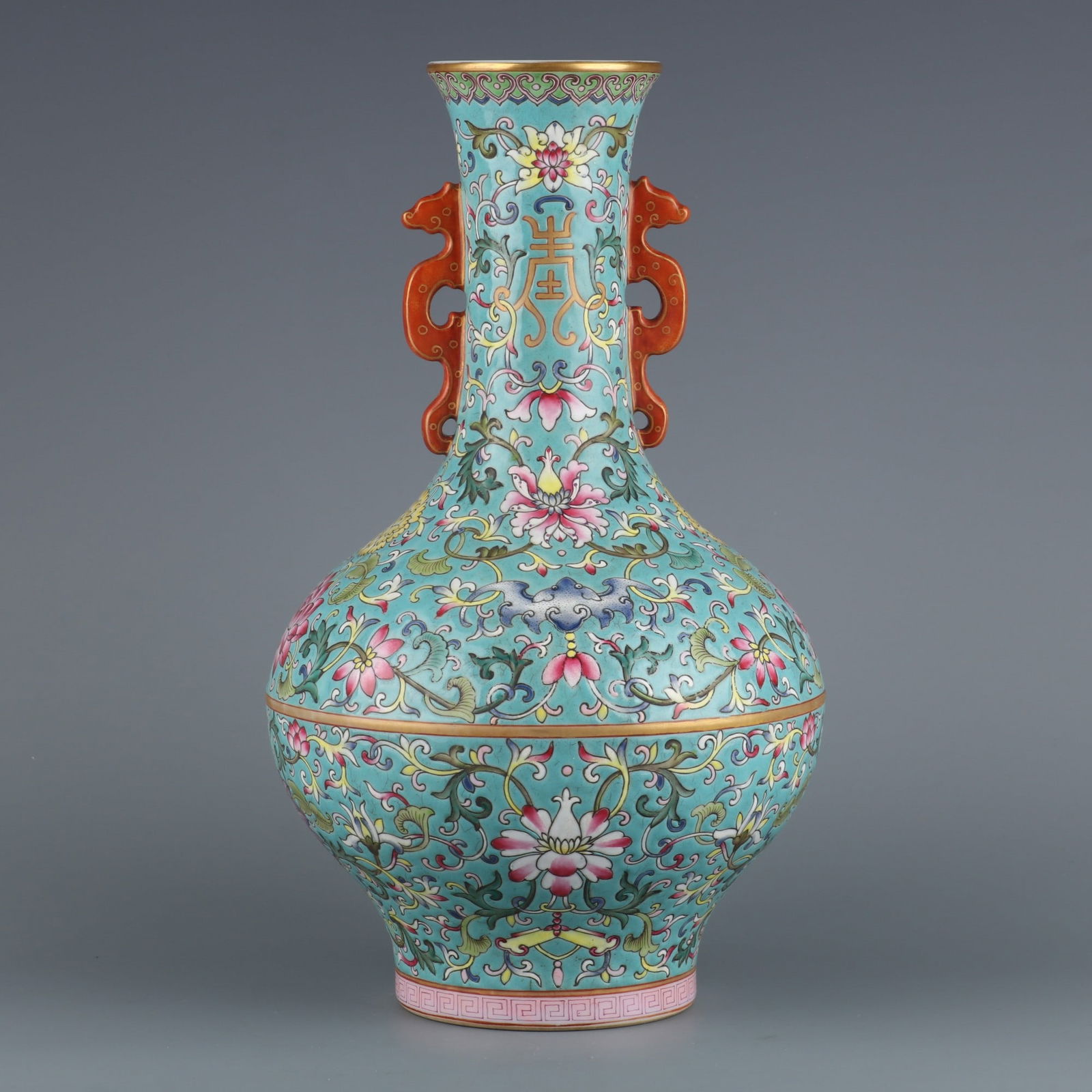 An Exquisite Famille-Rose Green Ground Bats and Peach Pattern Lotus Pattern Double-Ears Vase: An Exquisite Famille-Rose Green Ground Bats and Peach Pattern Lotus Pattern Double-Ears Vase Qing Dynasty, China Qianlong Six-character Mark Size:12.9in绿地粉彩宝相