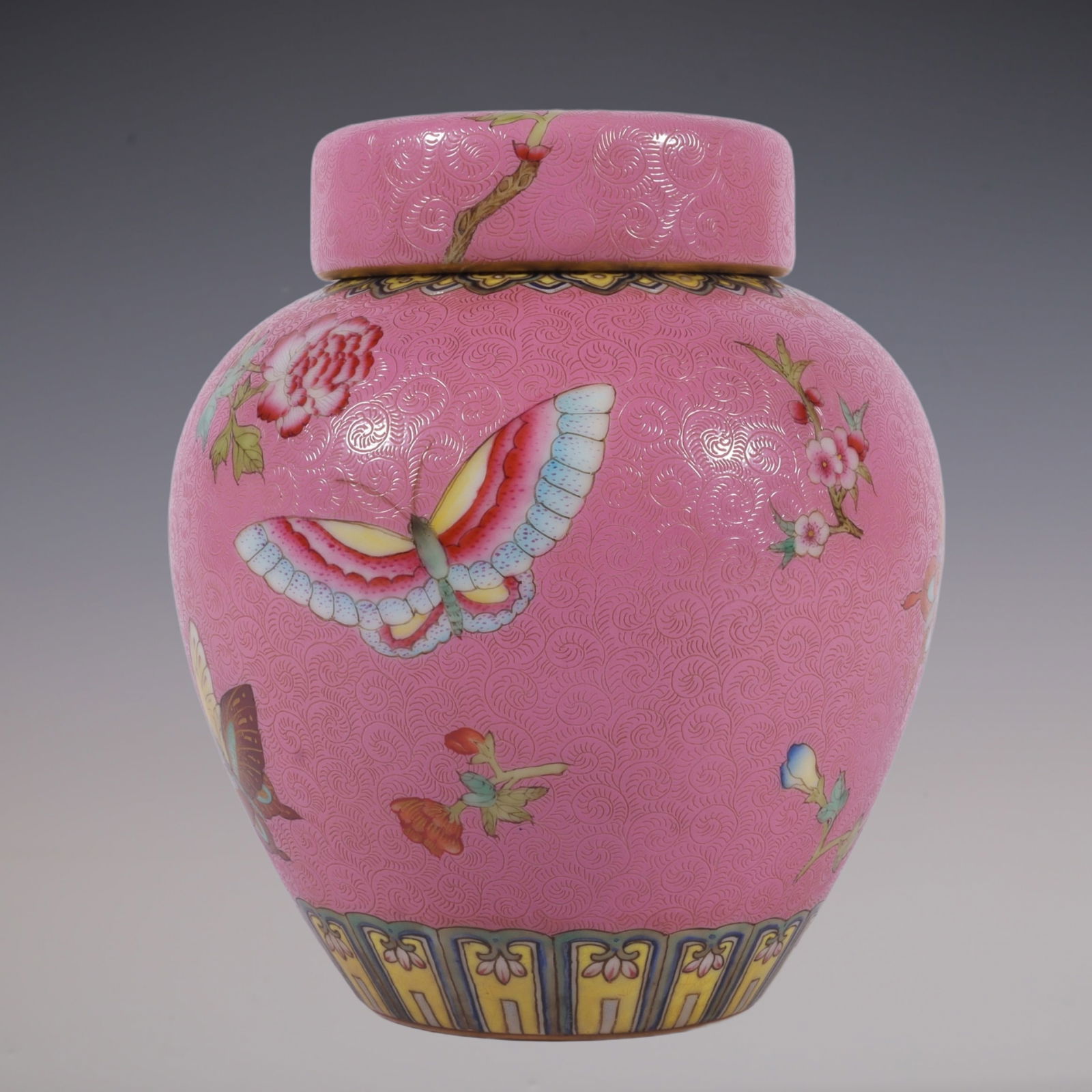 An Exquisite Famille-Rose Flower and Butterfly Pattern Tea Caddy: An Exquisite Famille-Rose Flower and Butterfly Pattern Tea Caddy Qing Dynasty, China Qianlong Six-character Mark