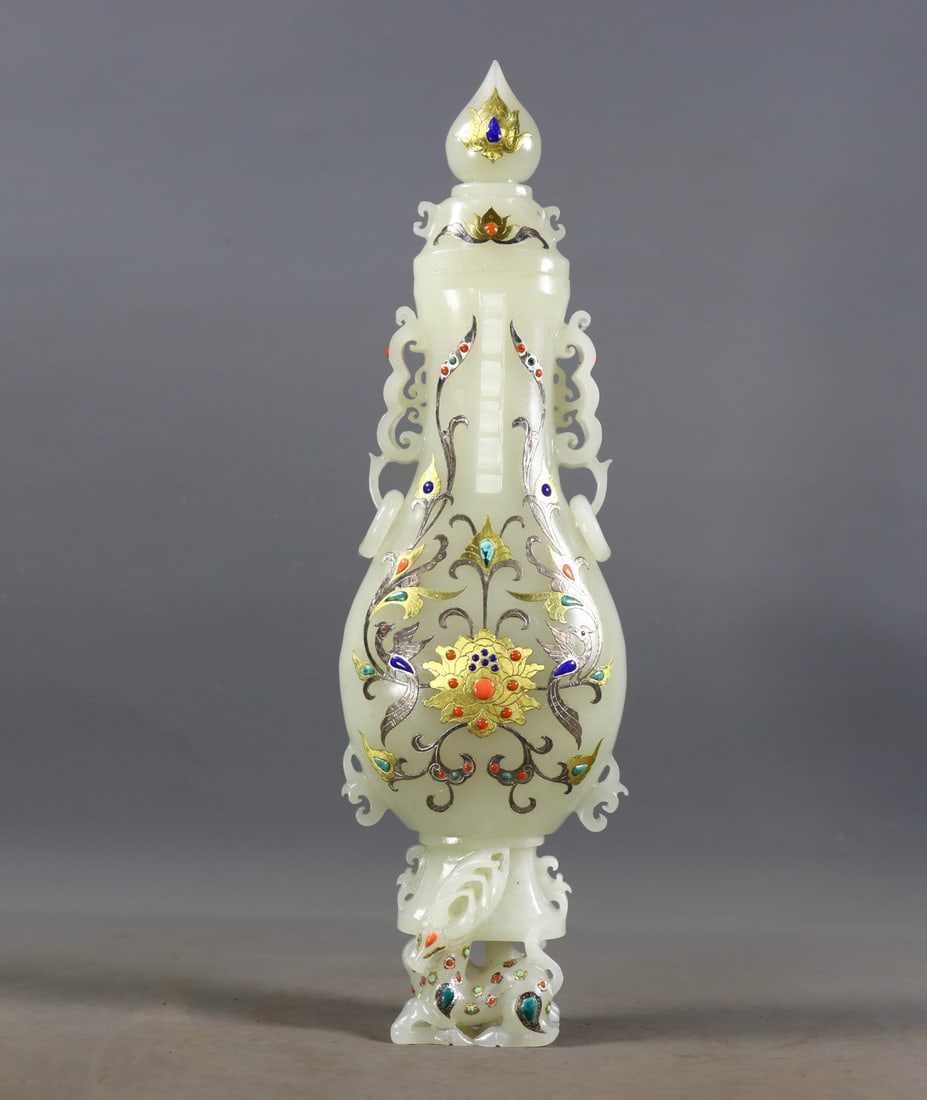 An Exquisite White Jade Gold and Silver Inlaid Gems Flower and Bird Pattern Vase: An Exquisite White Jade Gold and Silver Inlaid Gems Flower and Bird Pattern Vase Qing Dynasty, China Size:11.2inx3.1inx1.8in Weight:744g白玉错金银镶嵌宝