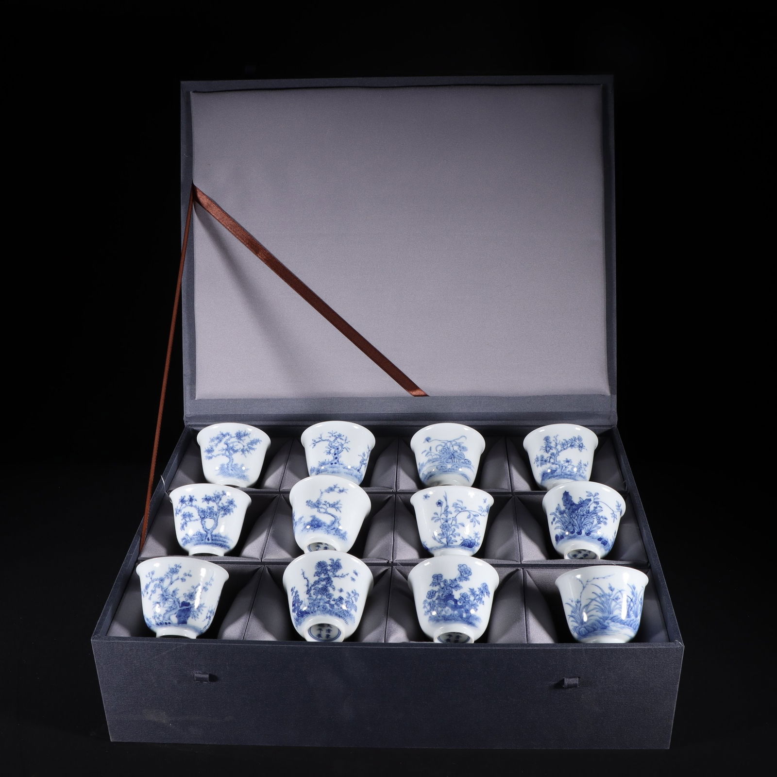 A Set of Fine Blue and White Flower Pattern Cup: A Set of Fine Blue and White Flower Pattern Cup Qing Dynasty, China Kangxi Six-character Mark Size:2inx2.6in青花十二花神杯 中国清代 &#