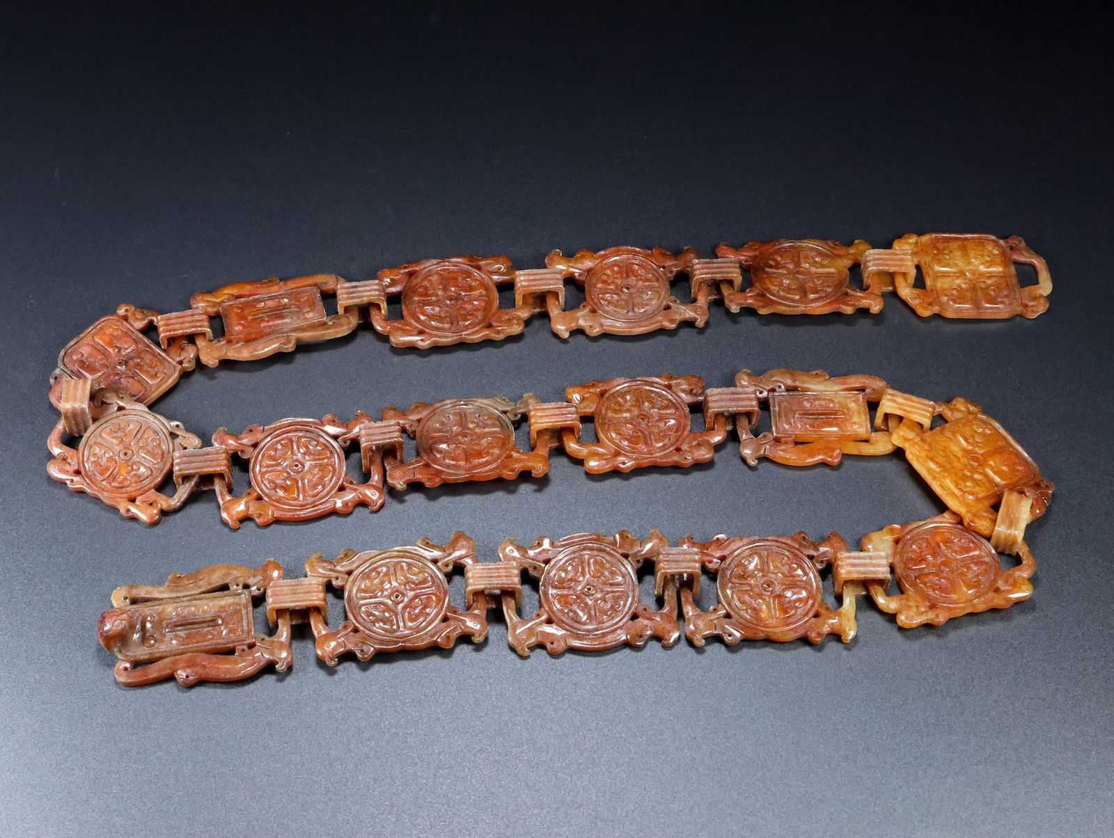 An Exquisite White Jade Dragon and Phoenix Pattern Ornament: An Exquisite White Jade Dragon and Phoenix Pattern Ornament Han Dynasty, China Size:44.1inx1.8inx1in Weight:363g白玉龙凤呈祥玉腰带 中国