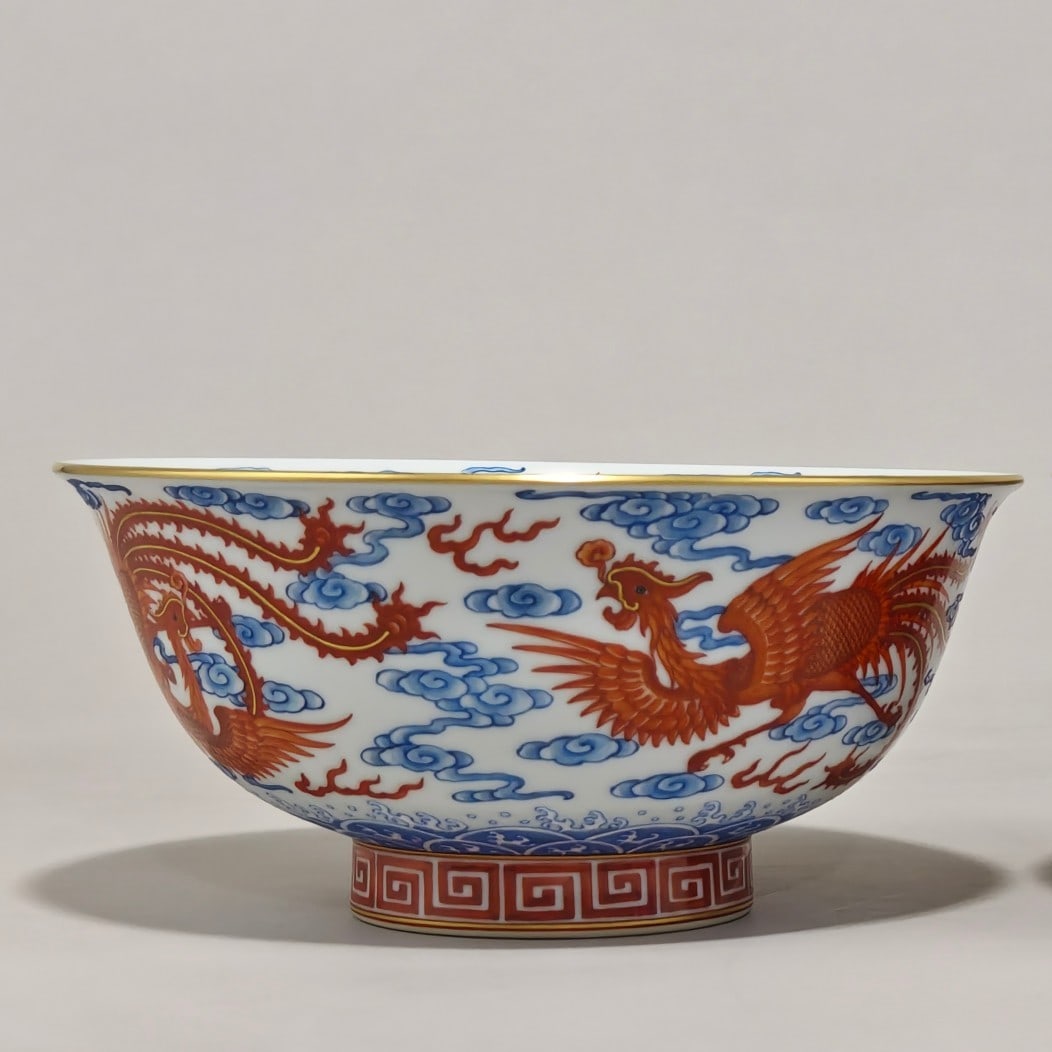 An Exquisite Famille-Rose Iron-Red Painted Gold Seawater Pattern Phoenix Pattern Bowl: An Exquisite Famille-Rose Iron-Red Painted Gold Seawater Pattern Phoenix Pattern Bowl Qing Dynasty, China Yongzheng Six-character Mark Size:3.8inx8in粉彩矾红描金