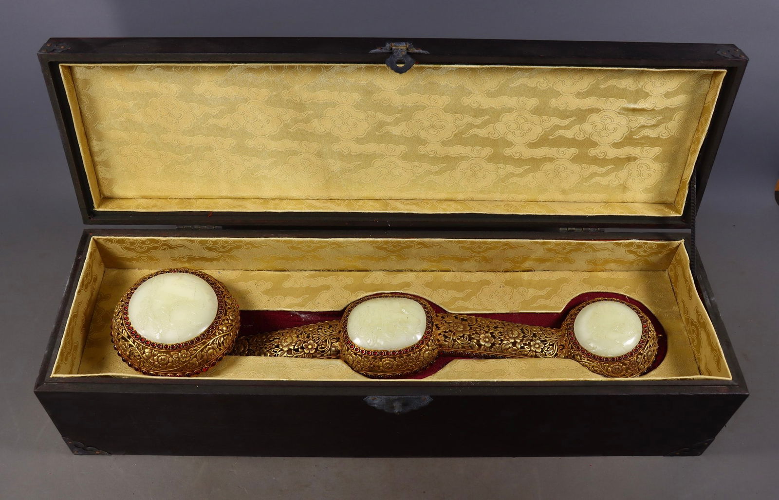 An Exquisite Gilt Bronze Inlaid White Jade Lotus Pattern Character and Story Pattern Ruyi: An Exquisite Gilt Bronze Inlaid White Jade Lotus Pattern Character and Story Pattern Ruyi Qing Dynasty, China Qianlong Six-character Mark Size:3.7inx18.5inx4.3in