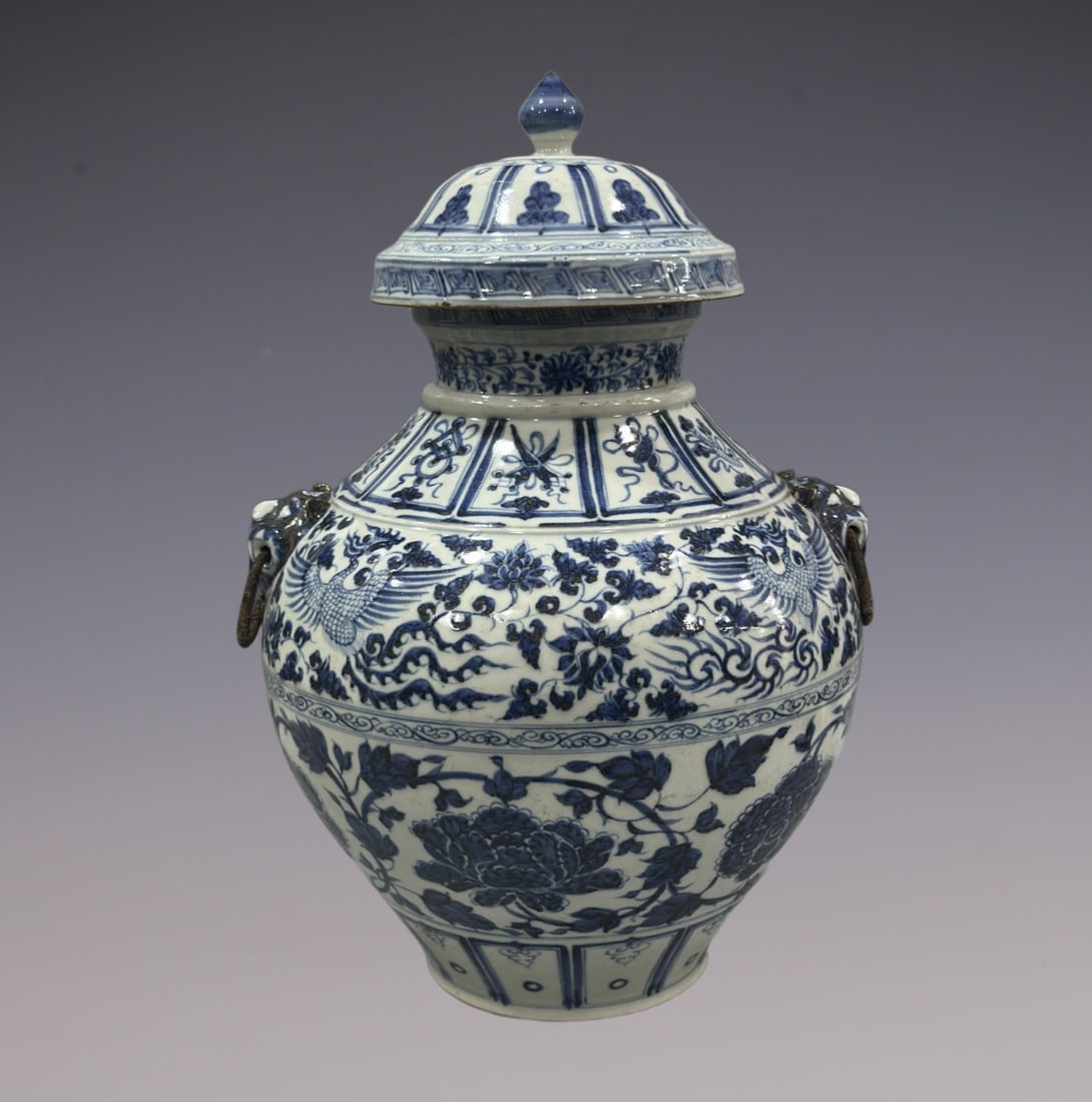 An Exquisite Blue and White Lotus Pattern Phoenix Pattern Double-Ears Jar: An Exquisite Blue and White Lotus Pattern Phoenix Pattern Double-Ears Jar Yuan Dynasty, China Size:18.7in青花缠枝莲凤凰纹罐