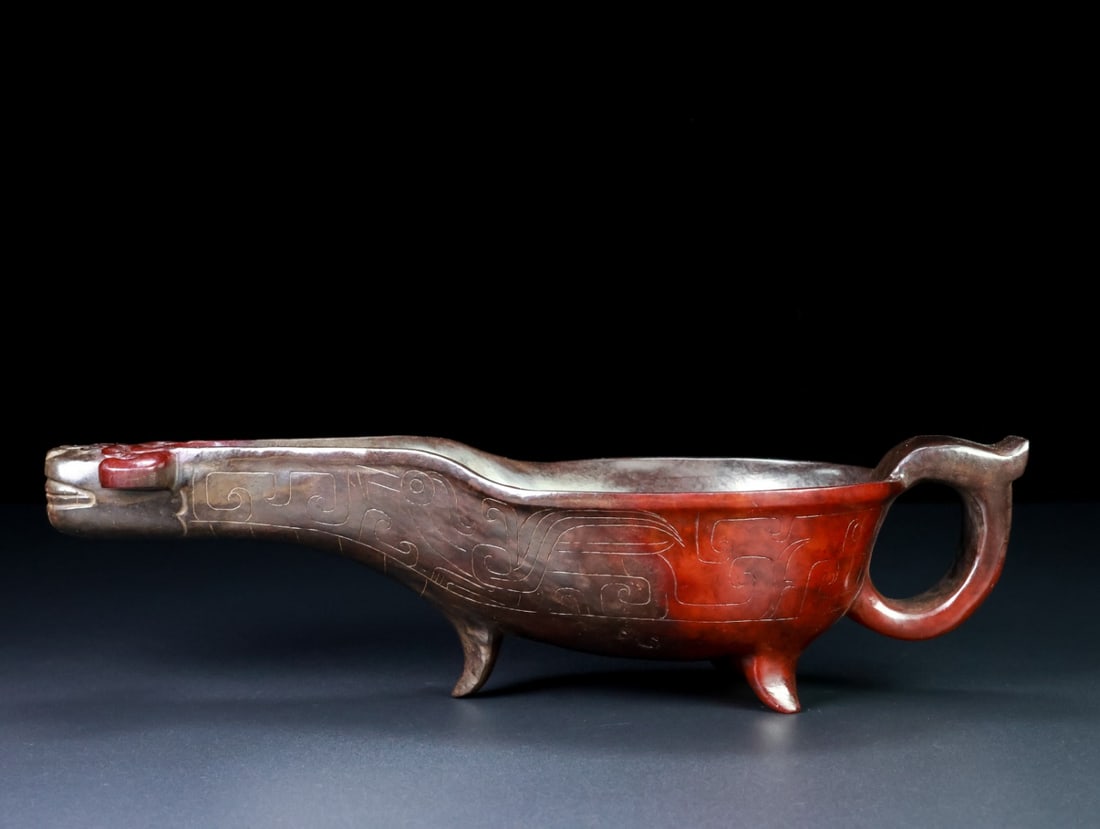 An Exquisite White Jade Beast-Face Pattern Cup: An Exquisite White Jade Beast-Face Pattern Cup Han Dynasty, China Size:10.1inx3.7inx2.6in Weight:409.5g白玉杯酒器 中国汉代 Size:25.7cmx9.5cmx6.7cm