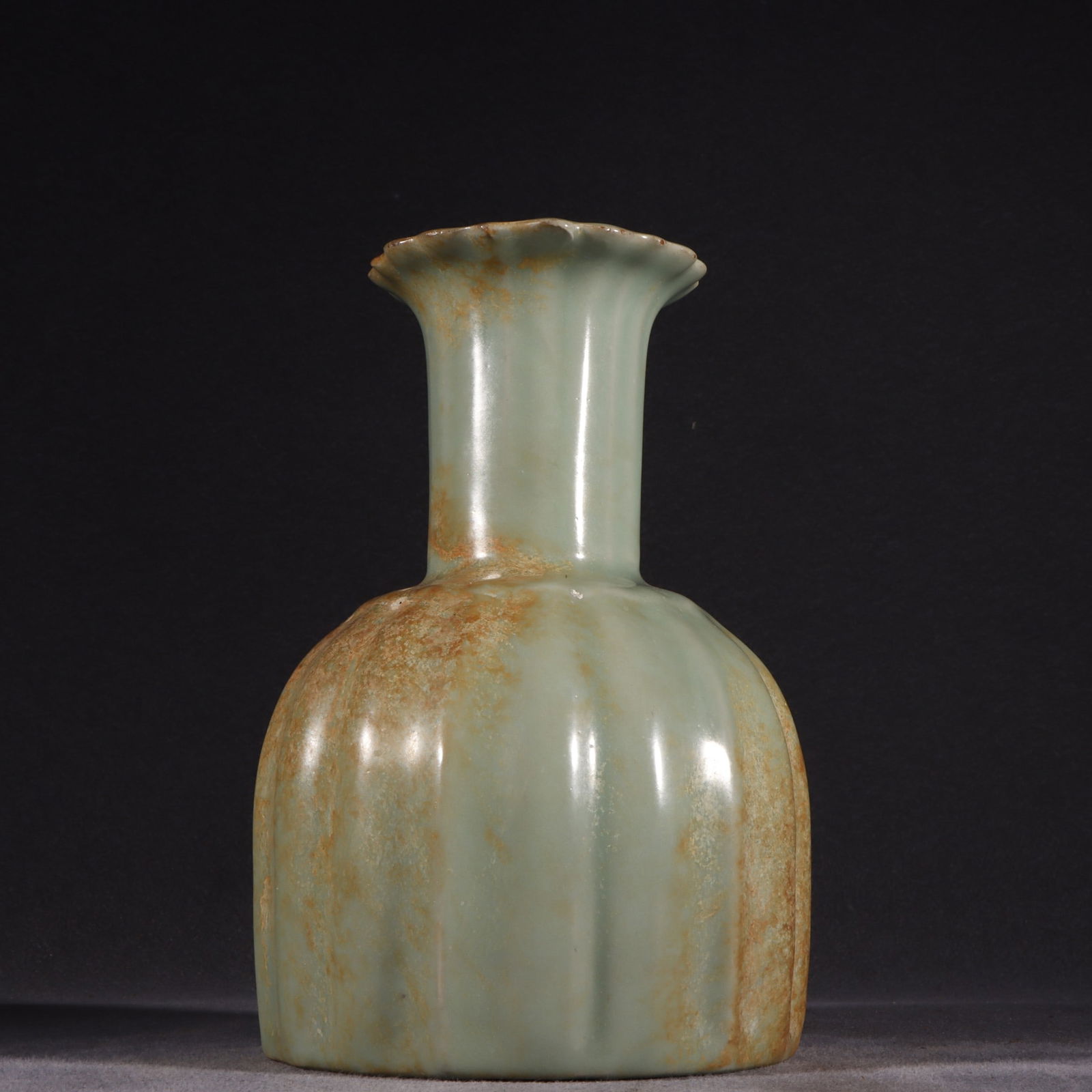 An Exquisite Guan yao Celadon Glazed Vase: An Exquisite Guan yao Celadon Glazed Vase Song Dynasty, China Size:8.5inx5.9in官窑粉青釉多棱瓶 中国宋代 Size:21.6cmx15cm
