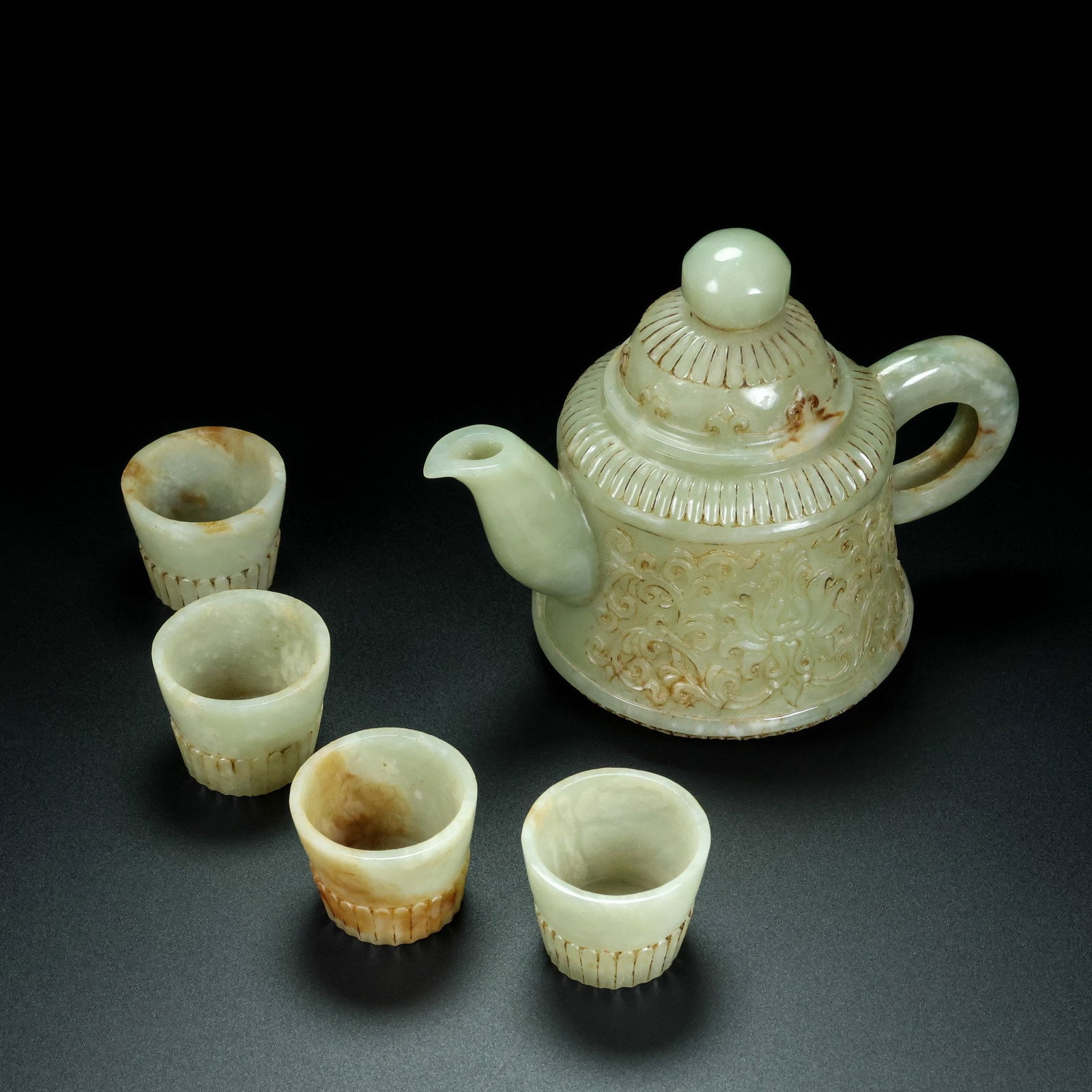 A Set of Fine White Jade Lotus Pattern Teapot Cup: A Set of Fine White Jade Lotus Pattern Teapot Cup Qing Dynasty, China Size:5.3inx6.7inx3.9in Size:1.4inx1.8in Weight:633g白玉玉壶一套