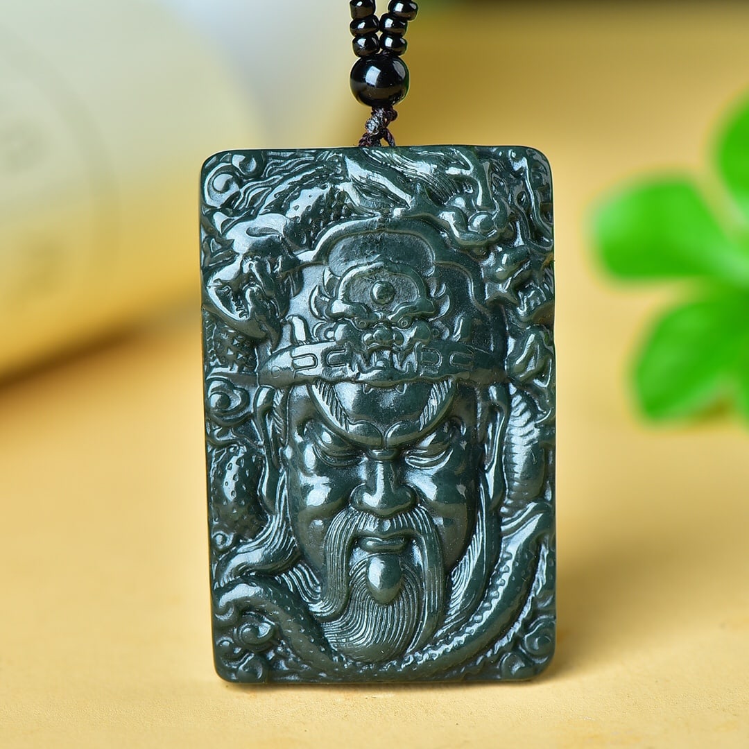 An Exquisite Sapphire Guangong and Dragon Pattern Pendant: An Exquisite Sapphire Guangong and Dragon Pattern Pendant,Size:57mmx38mm 寓意:保佑平安的护法珈蓝,佩戴关公,