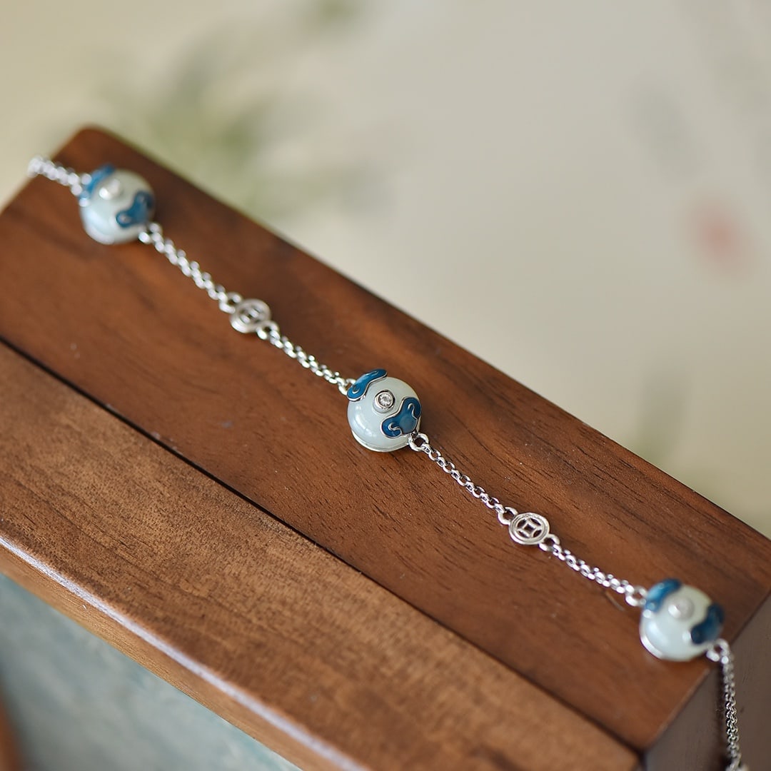 An Exquisite Sterling Silver Inlaid White Jade Enamel Bracelet: An Exquisite Sterling Silver Inlaid White Jade Enamel Bracelet,Size:8mmx8mm 纯银镶白玉珐琅手链