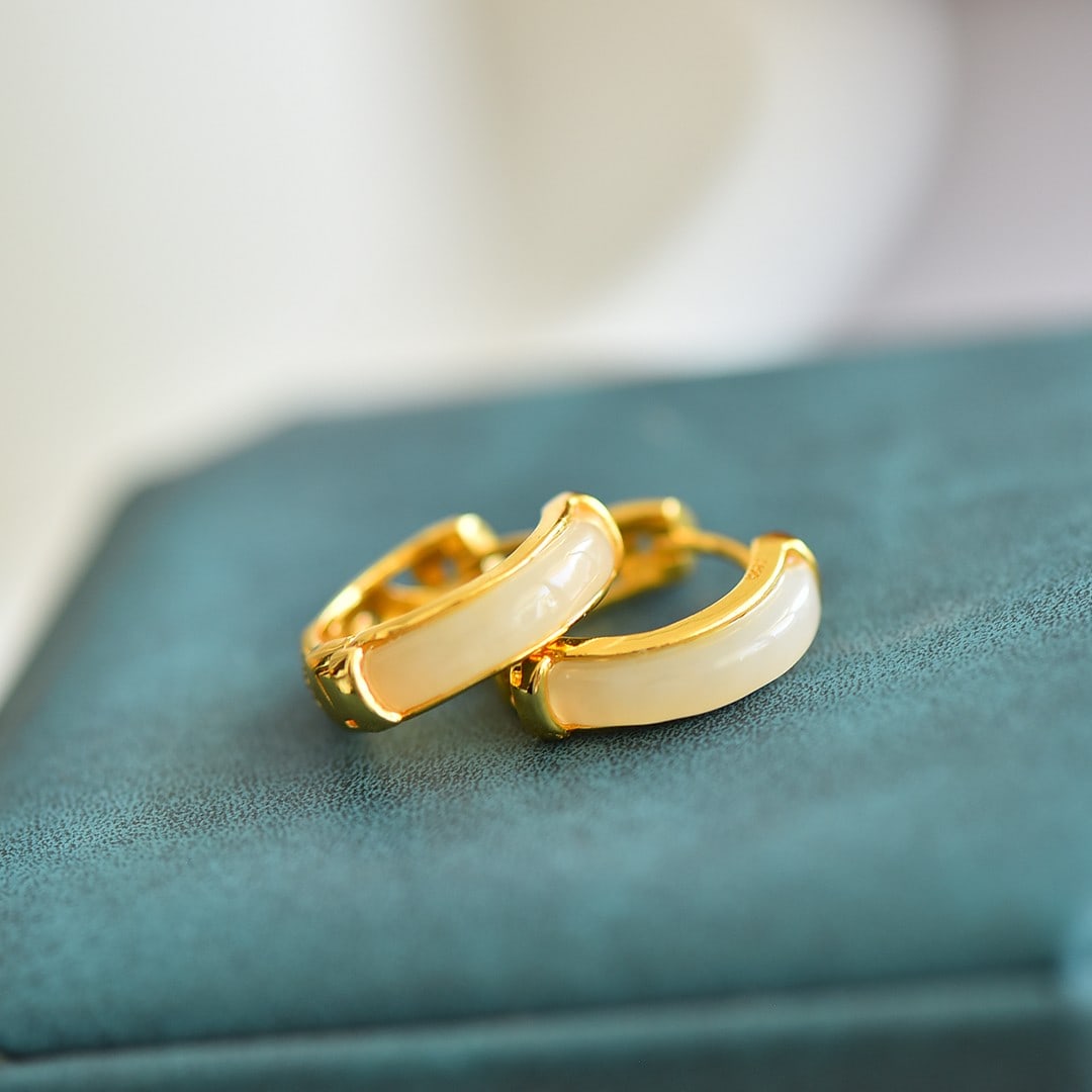 A Pair of Exquisite Sterling Silver-Gold Plated Inlaid White Jade Earrings: A Pair of Exquisite Sterling Silver-Gold Plated Inlaid White Jade Earrings,Size:3mmx16mm 一对纯银镀金镶白玉耳环