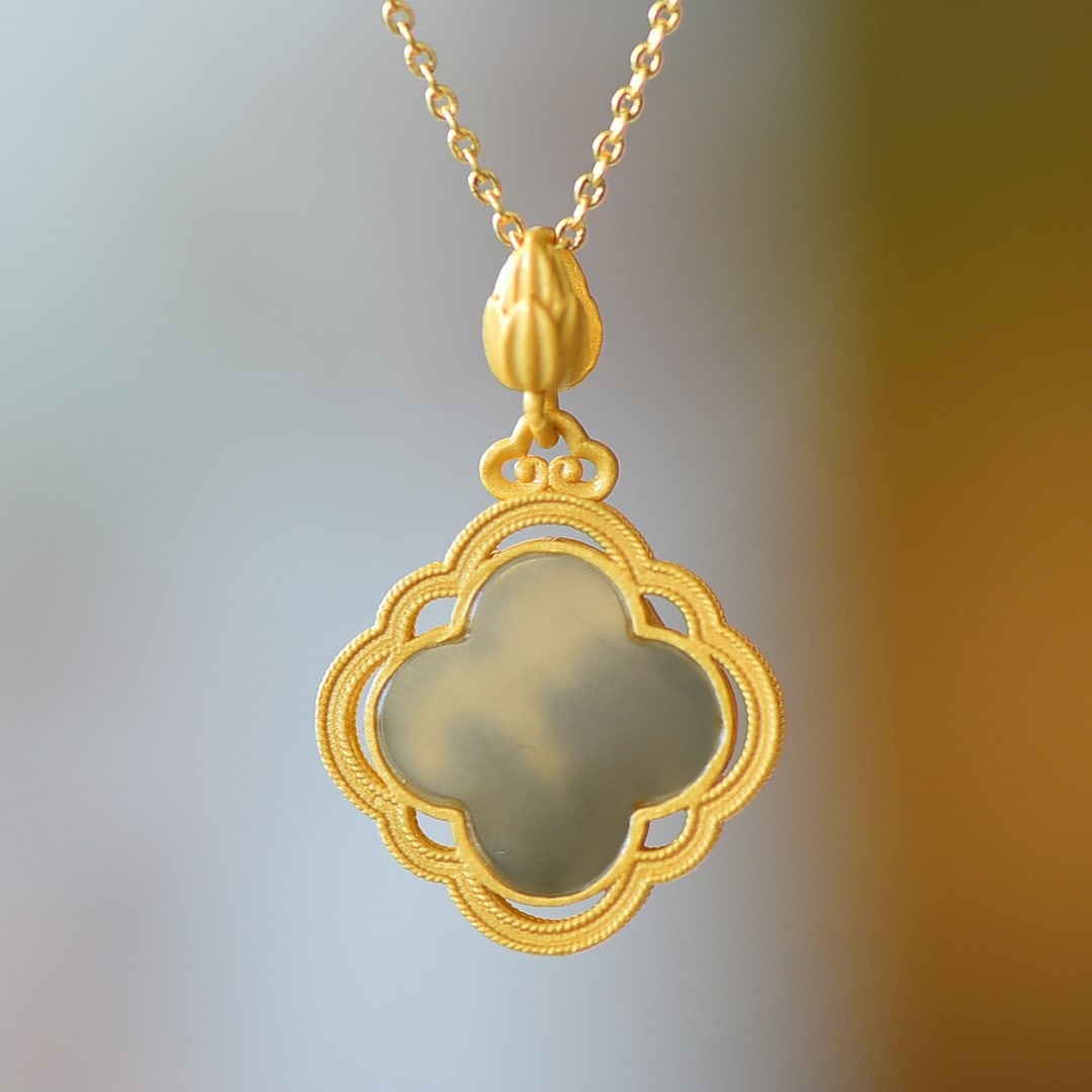 An Exquisite Sterling Silver-Gold Plated Inlaid White Jade Pendant: An Exquisite Sterling Silver-Gold Plated Inlaid White Jade Pendant 纯银镀金镶白玉吊坠