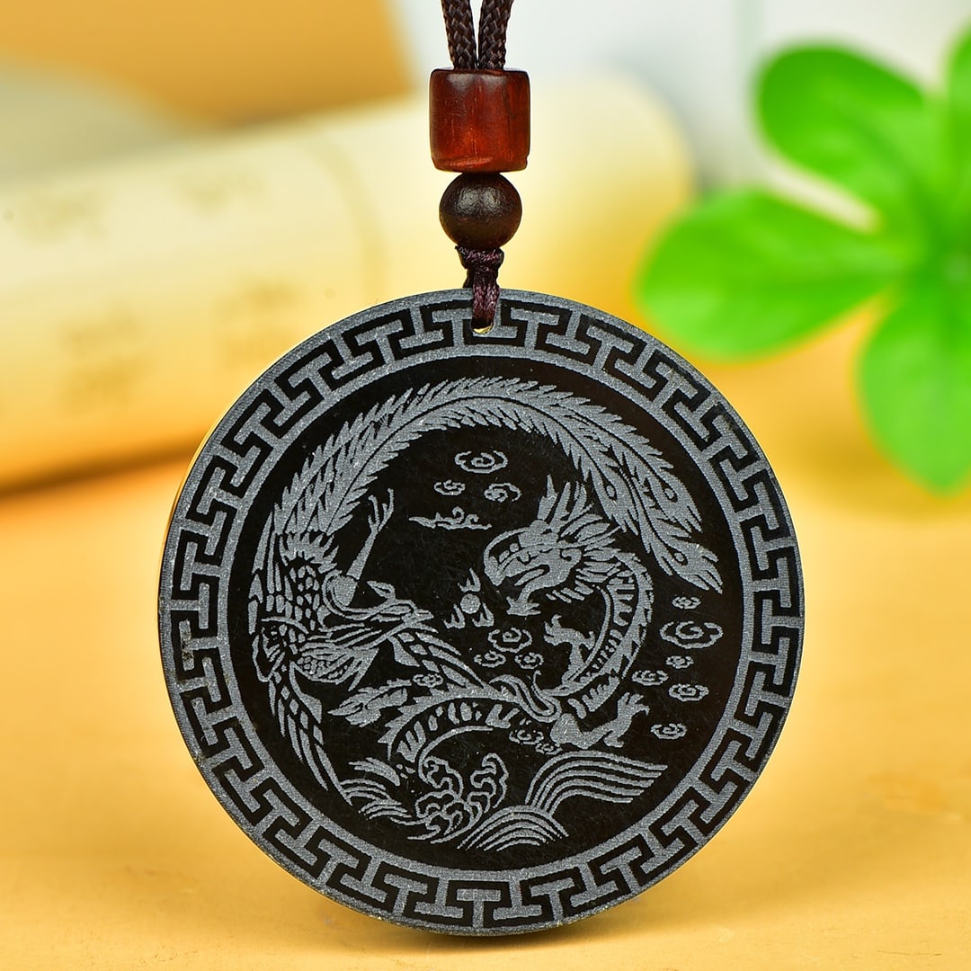 An Exquisite Sapphire Dragon and Phoenix Pattern Pendant: An Exquisite Sapphire Dragon and Phoenix Pattern Pendant,Size:52mmx52mm 寓意:龙行天下 青玉龙凤纹吊坠