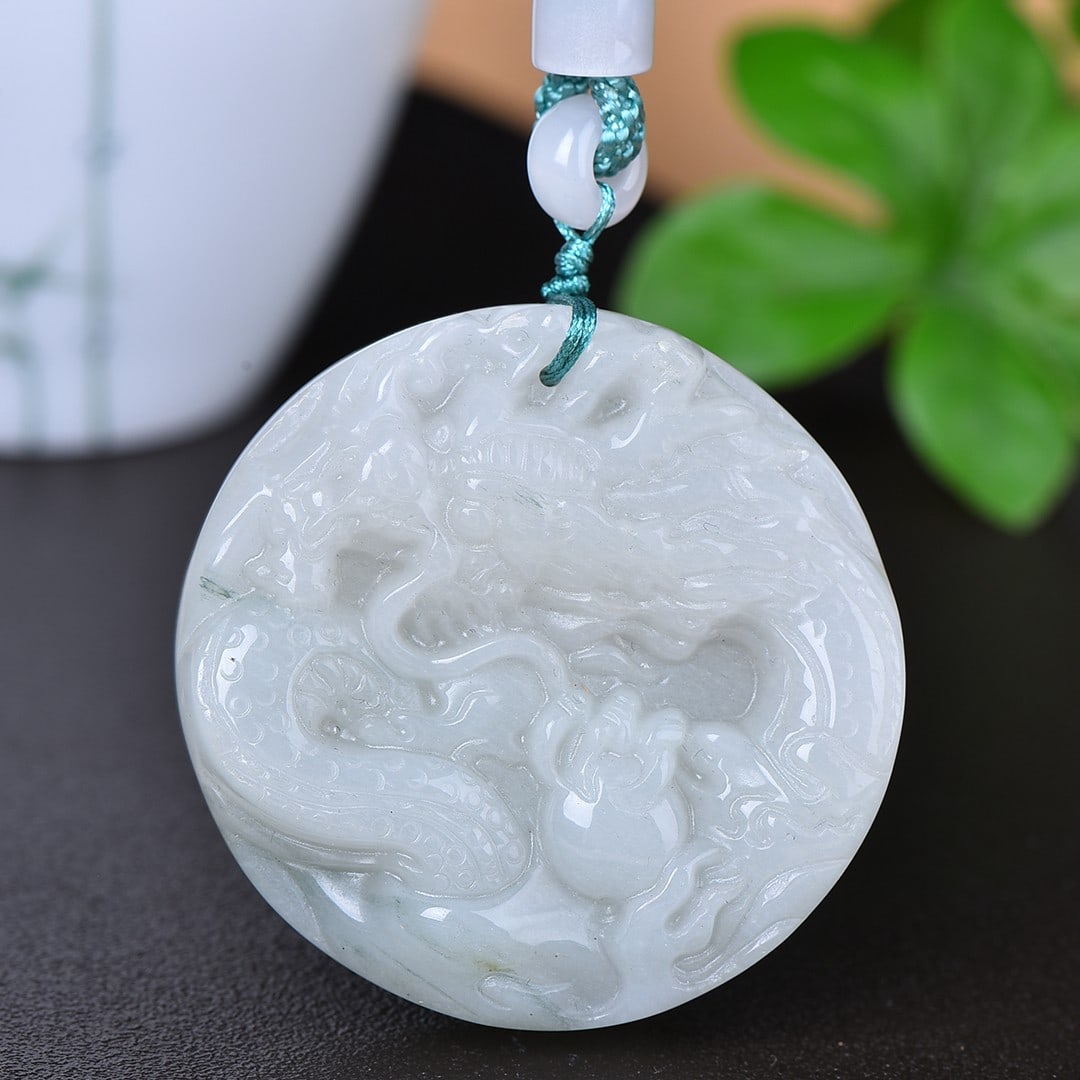 An Exquisite White Jade Dragon Pattern Pendant: An Exquisite White Jade Dragon Pattern Pendant,Size:49mmx49mm 寓意:吉祥安康 白玉龙纹吊坠