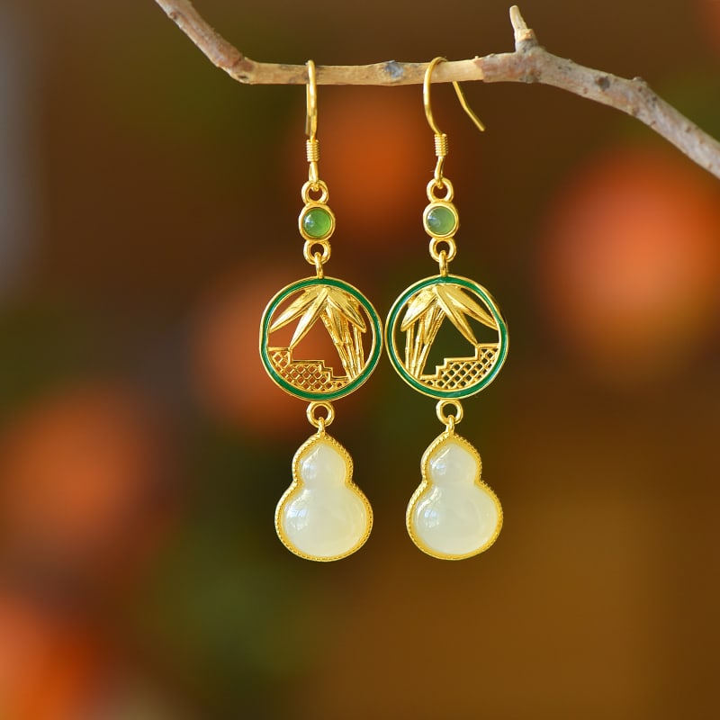 A Pair of Exquisite Sterling Silver-Gold Plated Inlaid White Jade Earrings: A Pair of Exquisite Sterling Silver-Gold Plated Inlaid White Jade Earrings 一对纯银镀金镶白玉耳环