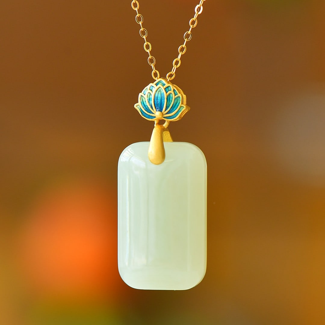 An Exquisite Sterling Silver-Gold Plated Inlaid White Jade Enamel Pendant: An Exquisite Sterling Silver-Gold Plated Inlaid White Jade Enamel Pendant,Size:14mmx23mm 纯银镀金镶白玉珐琅吊坠