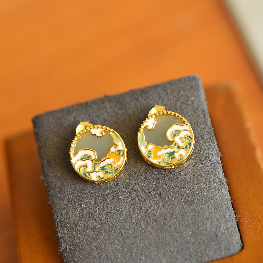A Pair of Exquisite Sterling Silver-Gold Plated Inlaid White Jade Earrings: A Pair of Sterling Silver-Gold Plated Inlaid White Jade Earring , Size :10mmx10mms 一对纯银镀金镶白玉耳钉,尺寸:10mmx10mm