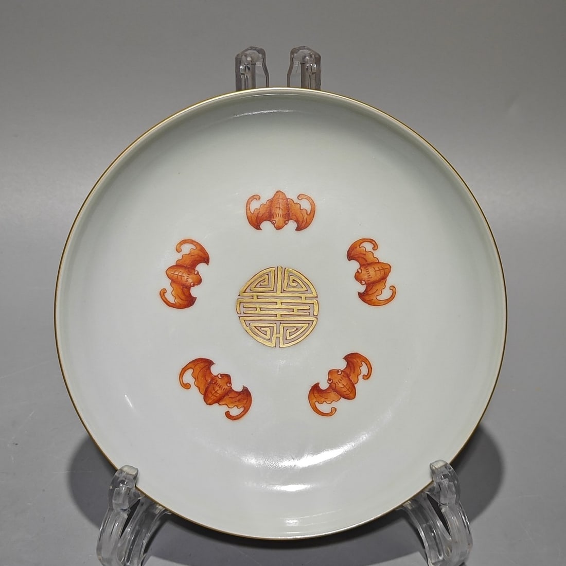 An Exquisite Enamel Red Glazed Painted Gold Lotus?Bats and Peach Pattern Plate: An Exquisite Enamel Red Glazed Painted Gold Lotus,Bats and Peach Pattern Plate,Qing Dynasty,China,Qianlong Six-character Mark,Size:6in 珐琅彩红釉描金缠&